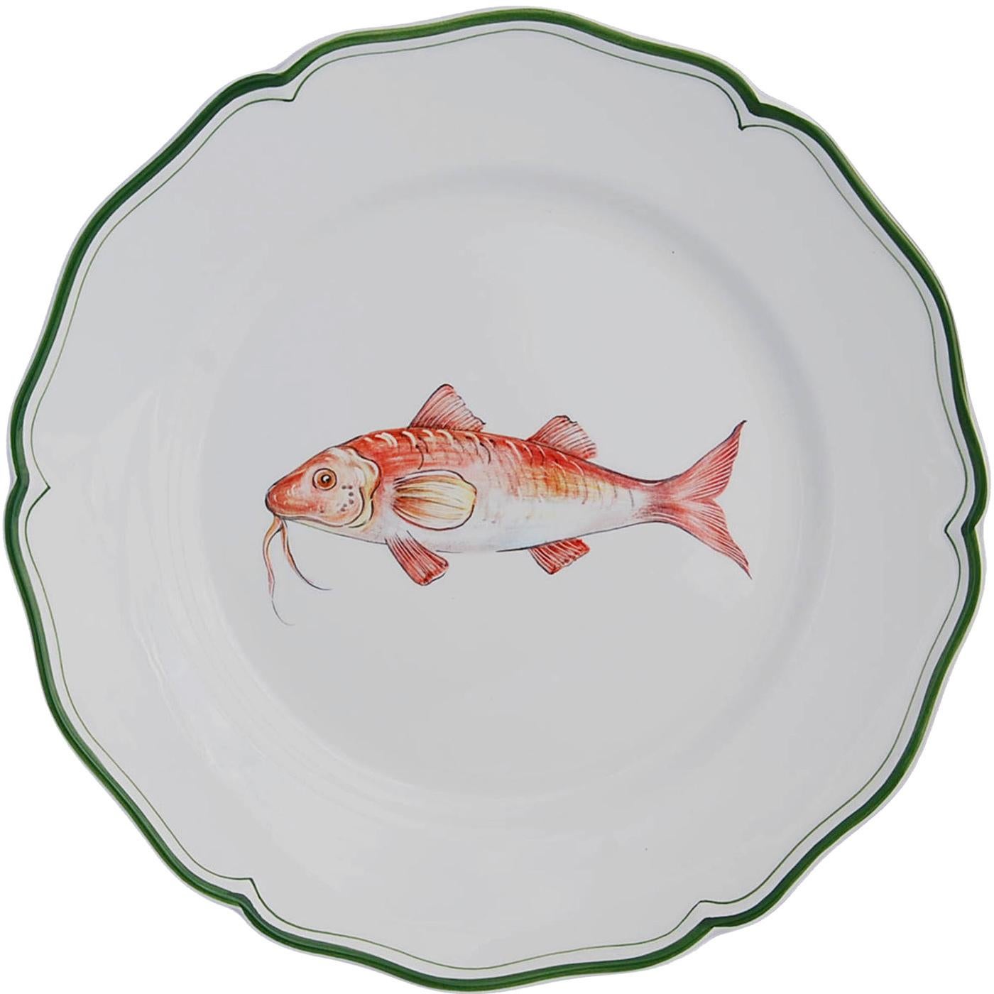Mediterranean fish decorate with different designs each piece in this collection of 6 dinner ceramic plates. Este has been crafting hand-painted earthenware building on a tradition dating back to the 15th century, but is now discovering new