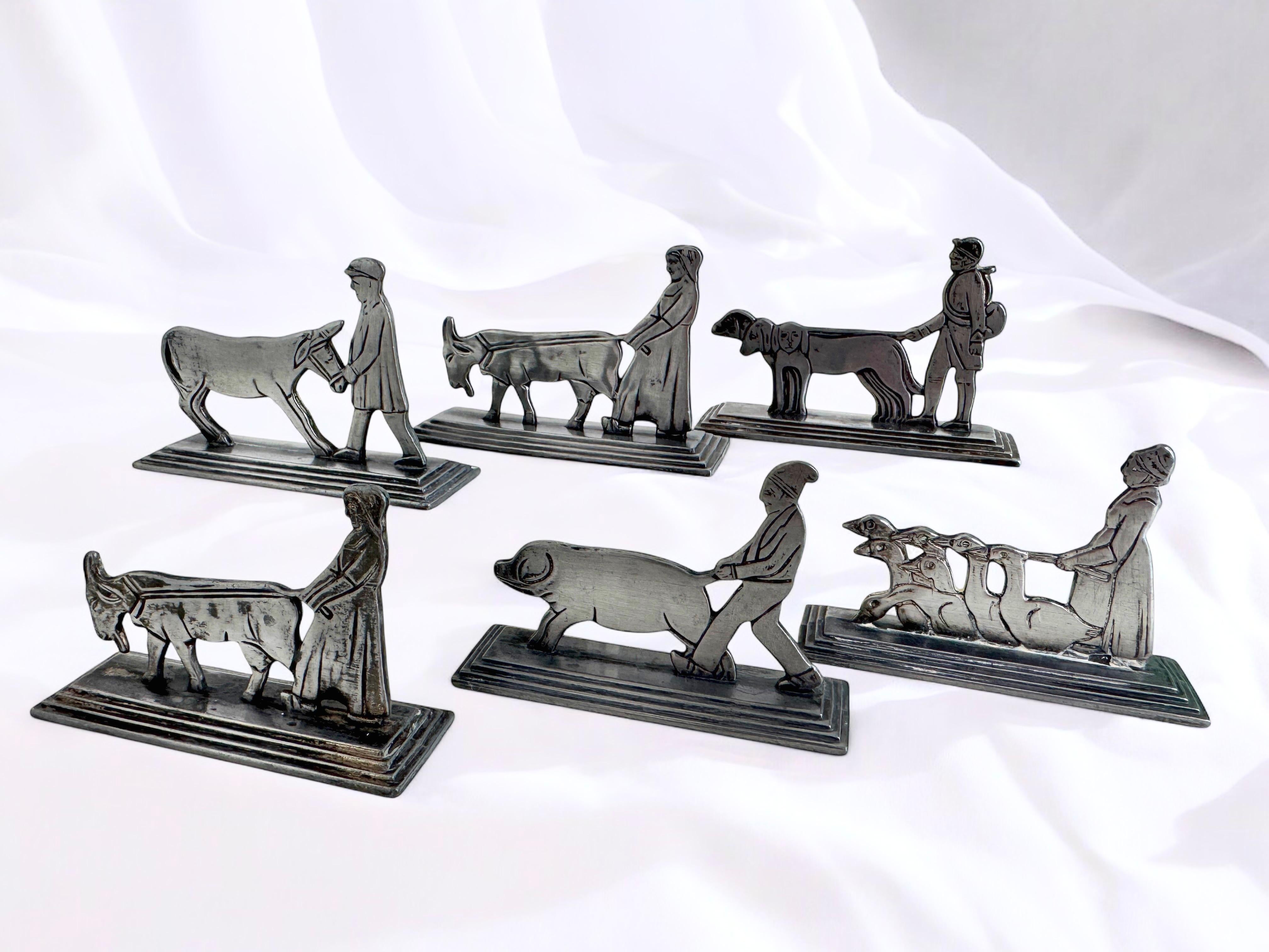 Metallo set di sei poggiacoltelli in metallo con motivi animali Francia XX secolo Art Deco in vendita