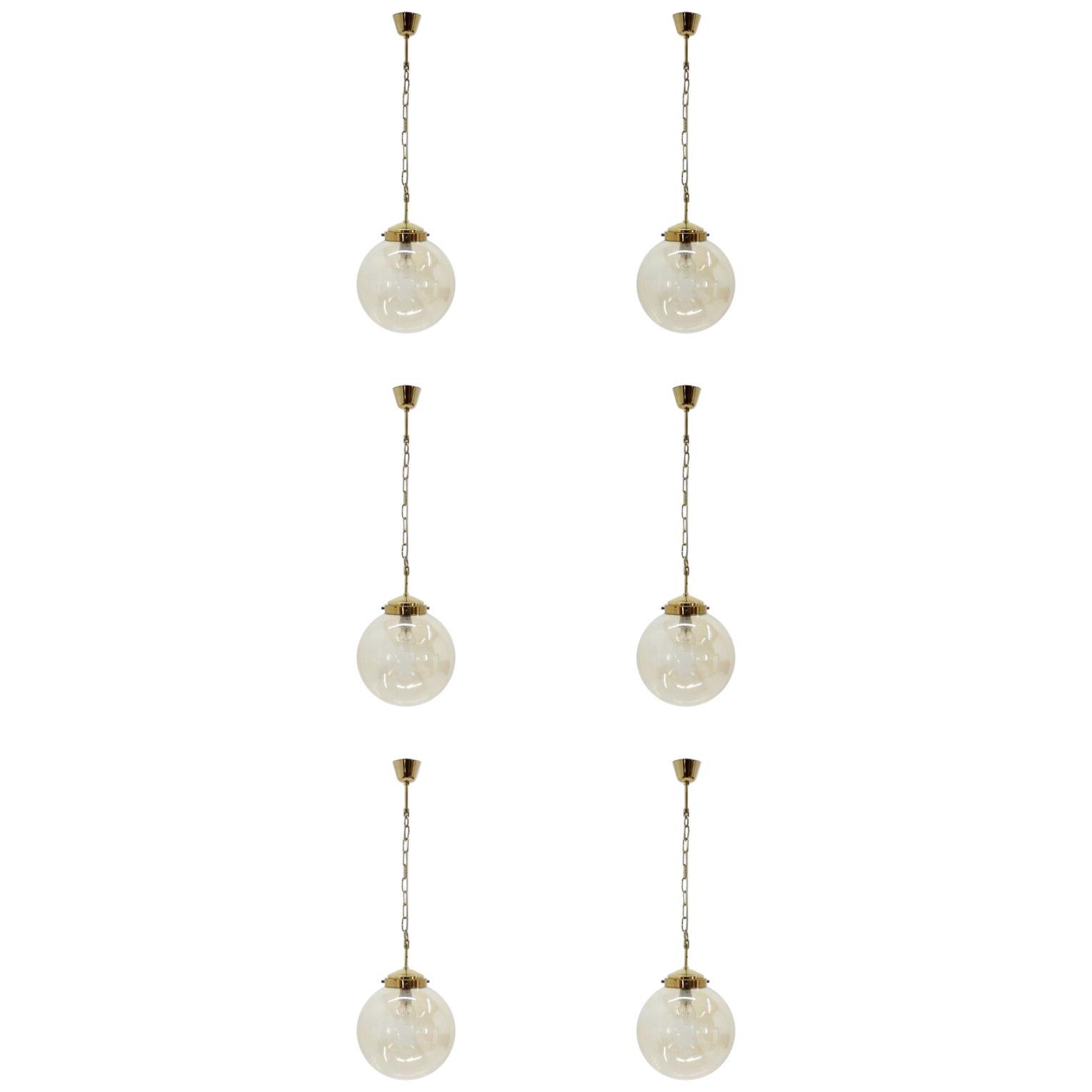 Set of six mid century brass pendants, 1970s For Sale