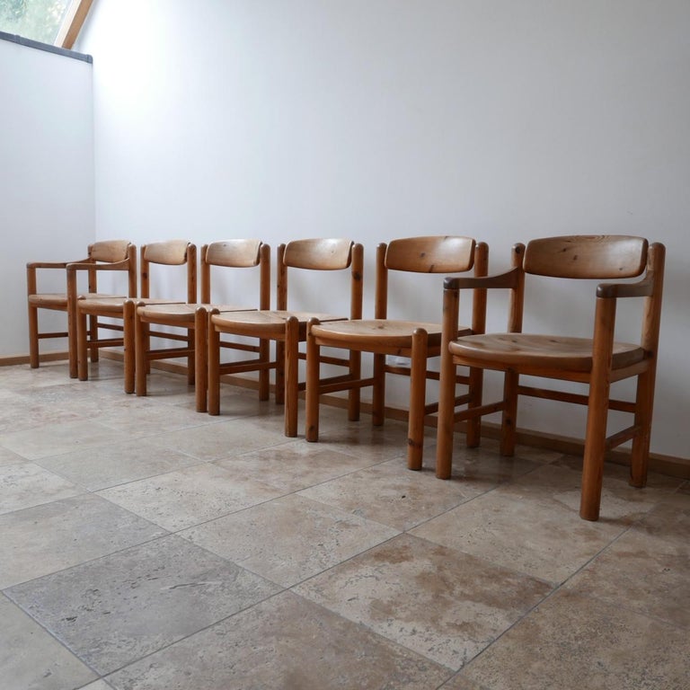 A run of six dining chairs by Rainer Daumiller for Hirtshals Saavaerk,

circa 1970s, Denmark.

Two carvers and four regular chairs.

Muted pine, which is much more good looking than the varnished versions which are shiny.

Dimensions: Carver