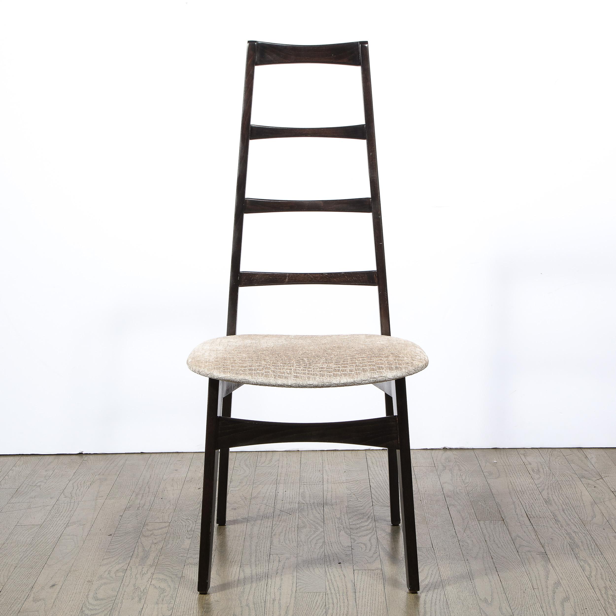 This elegant set of six Mid Century Modern chairs were designed by the great Niels Koefoed for Koefoeds Hornslet, model 