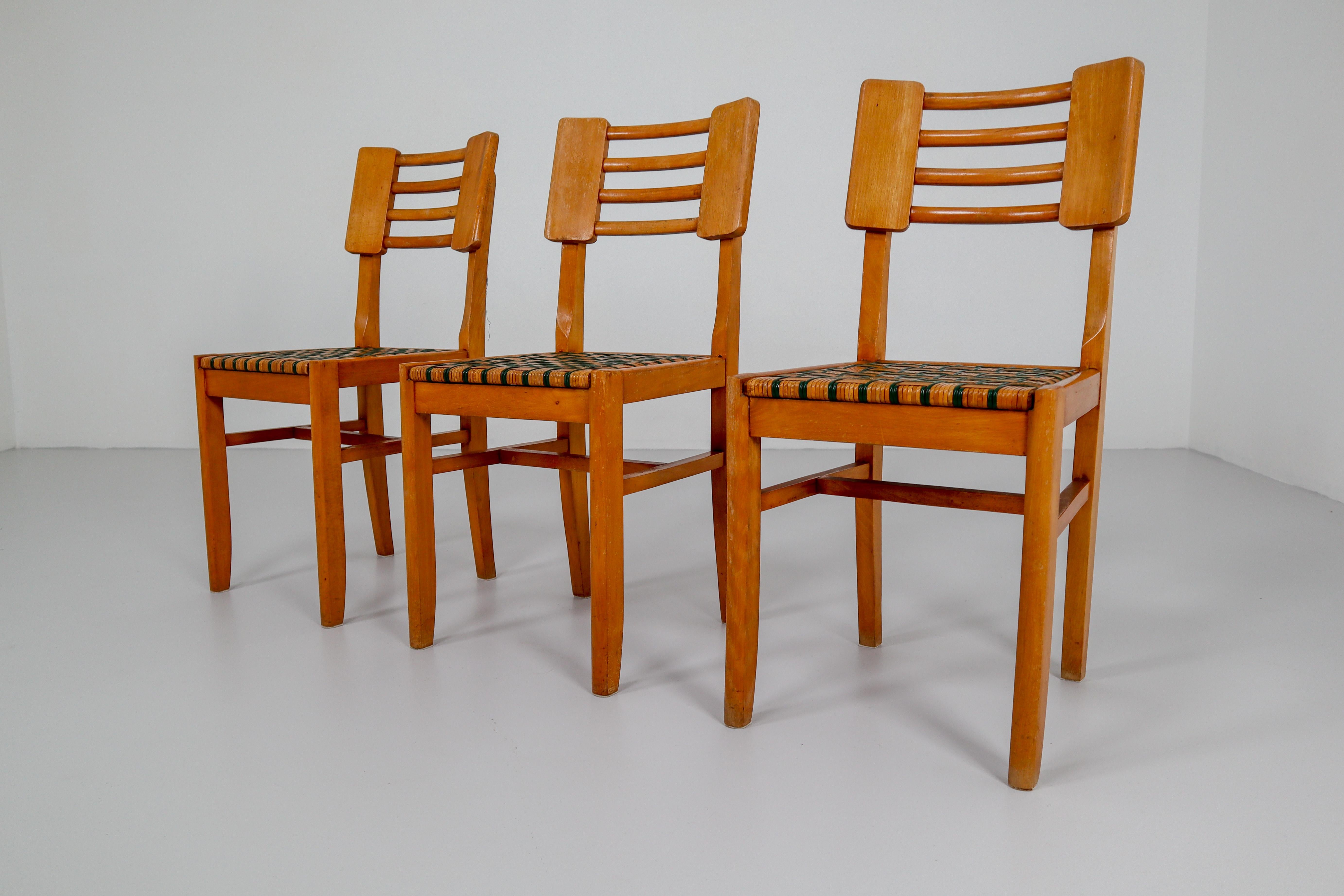 Beautiful set of six dinner chairs by unknown designer. Manufactured in France, circa 1950 in the manner of works by Charlotte Perriand or Gustave Serrurier-Bovy.
Solid beech frame and rattan seat, in good original condition.