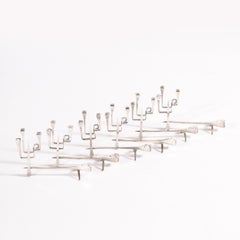 Set di sei segnaposto in nichel scultoreo francese del metà del secolo scorso