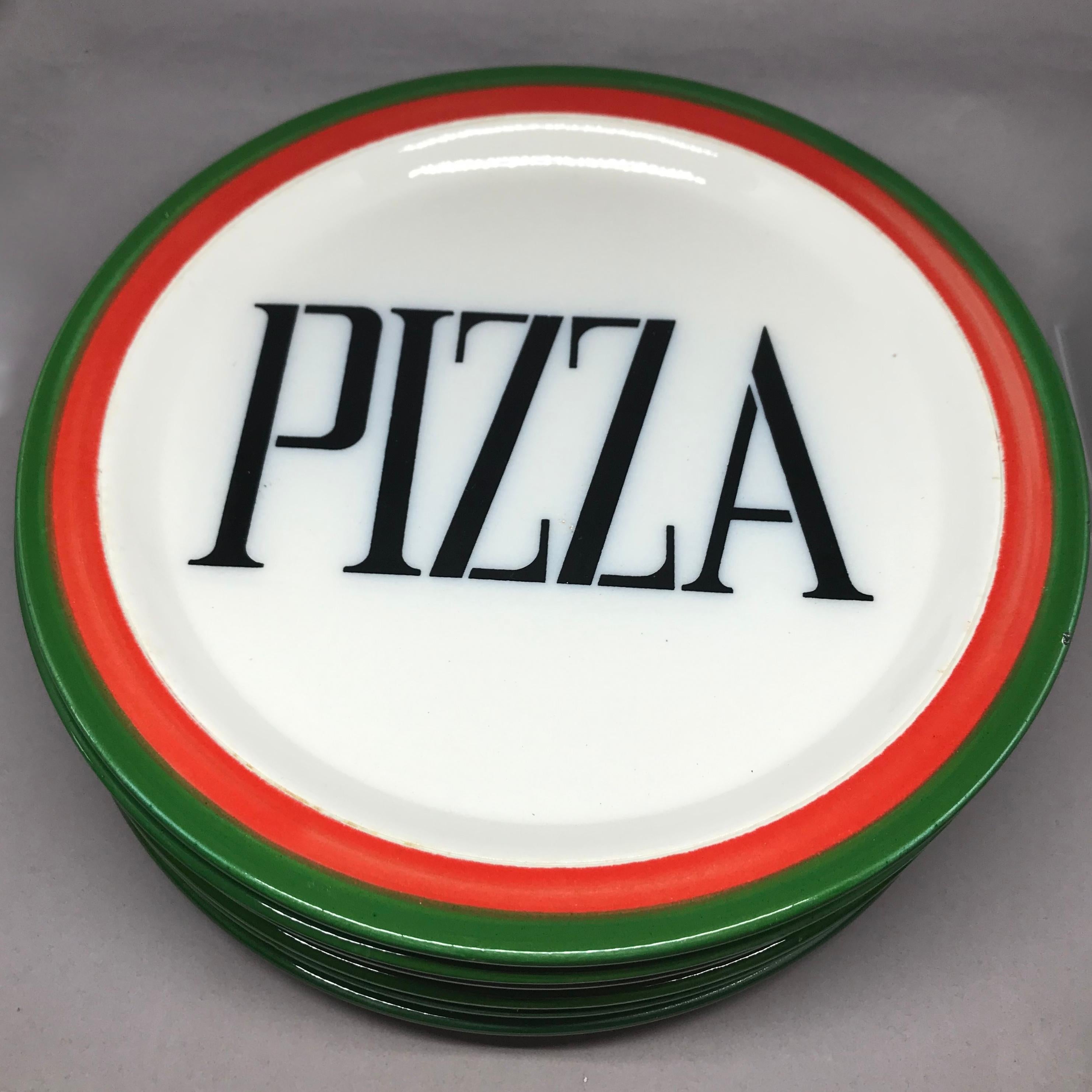 Set of six midcentury Italian pizza plates. Six boldly painted vintage ceramic plates with red and green borders, Italy, circa 1960.
Dimensions: 10