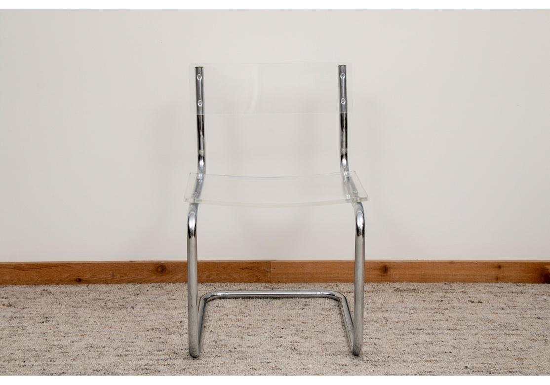 Set of Six period Mid-Century chairs with Lucite slab seats and backs after contemporary designs by Marcel Breuer. Circa 1970’s. Sturdy and quite comfortable. 
18 1/2