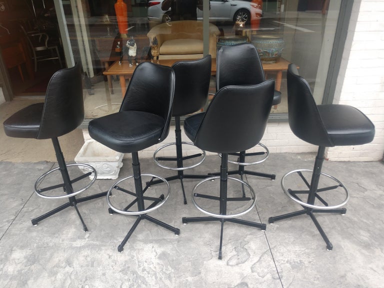 Fully adjustable in height from 30.5, 28.5, 26.5 and 24.5 seat heights. Swiveling freely bar stools are in amazing condition. Almost no wear. Made by the Admiral Chrome Corp from Detroit Michigan. Only 2 available.
Sold and priced individually.