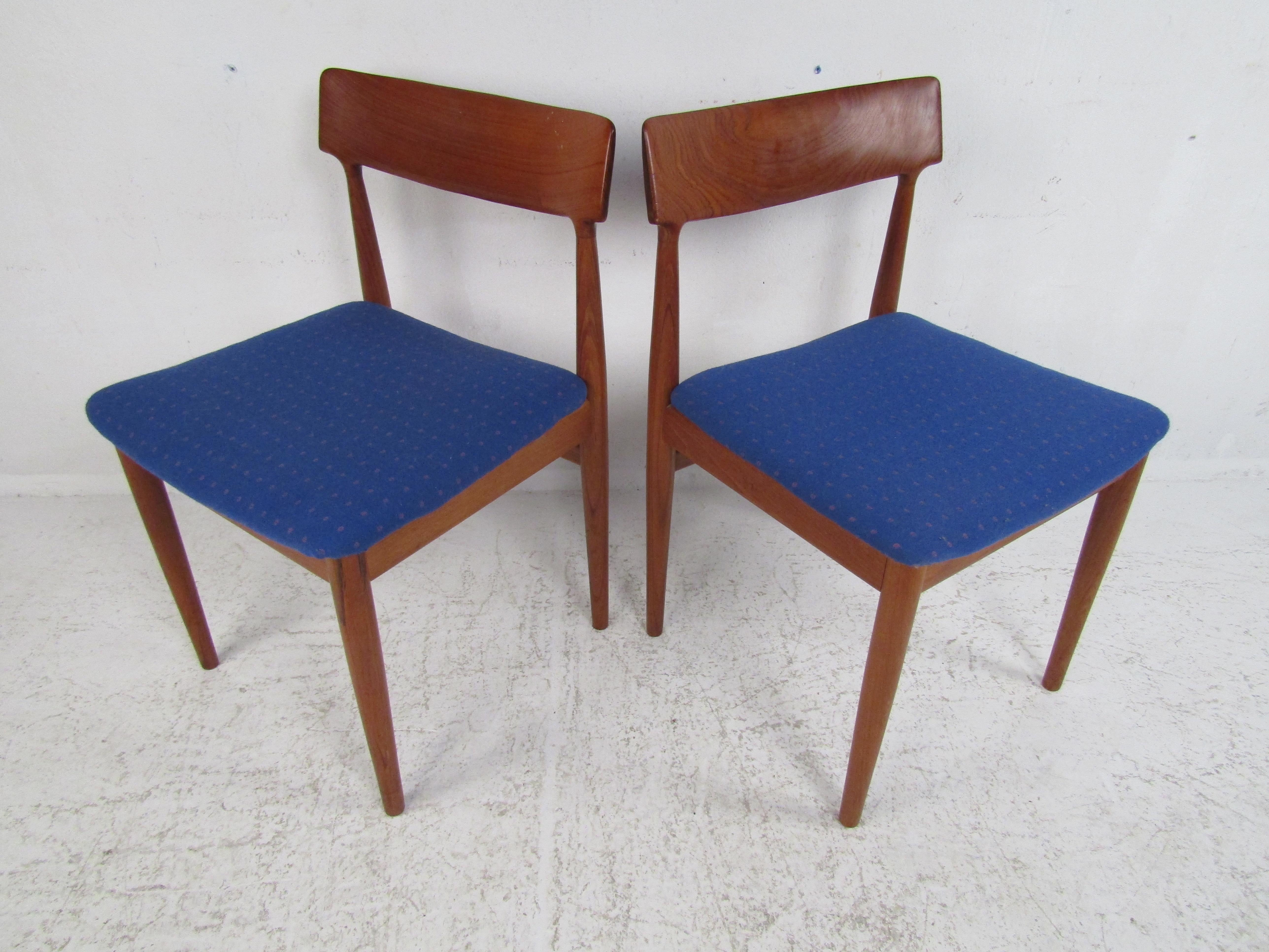 This stunning set of six vintage modern chairs are stamped, 