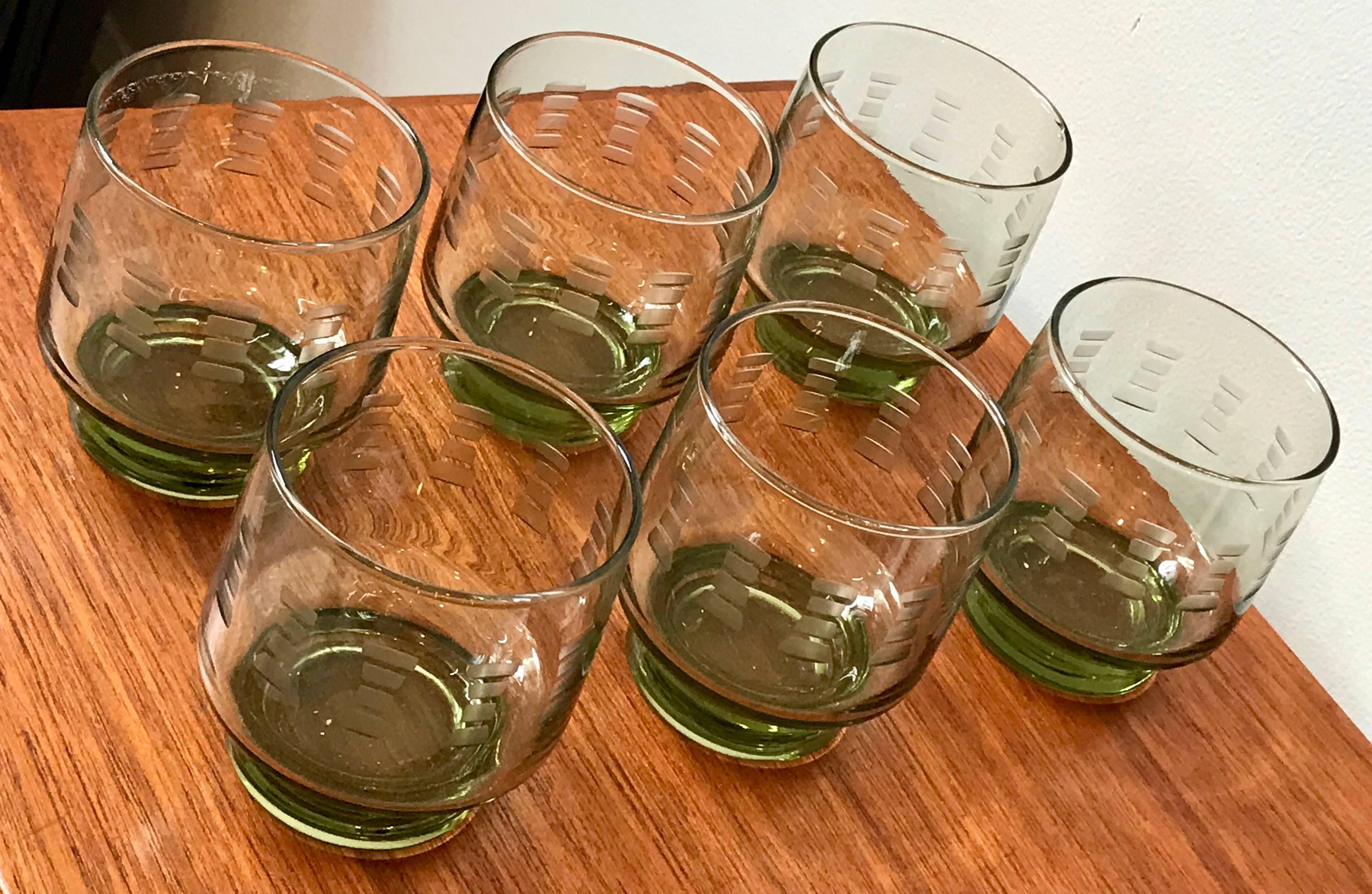 Very cool set of 1960s clear green glass cocktail rocks glasses with decorative etching.