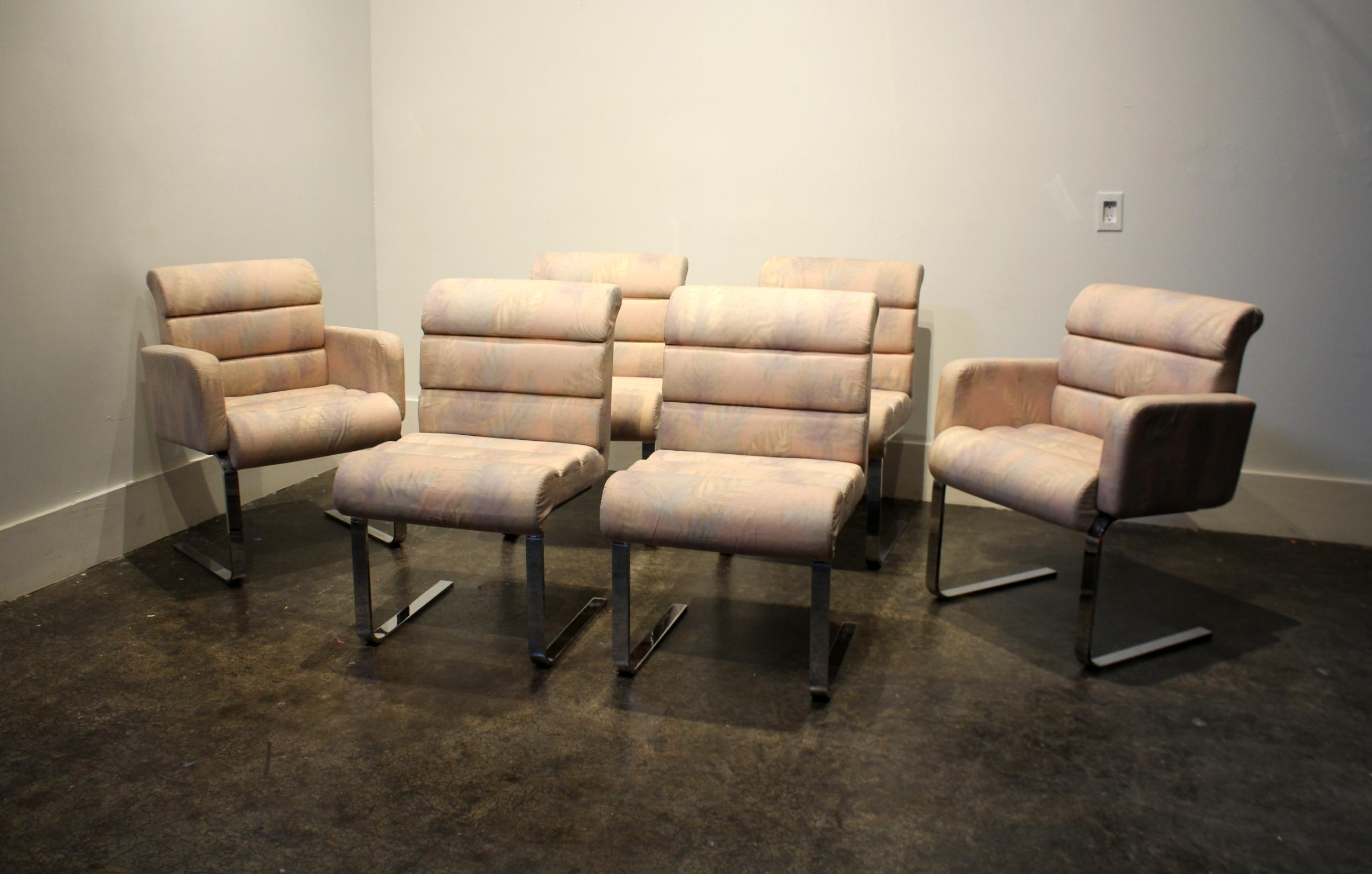 Set of six upholstered dining chairs on heavy, cantilevered chromed steel base designed by Frank Mariani for Pace in the 1970s. This set is from circa 1980 and has its original pastel fern print upholstery. Thickly padded and very comfortable!