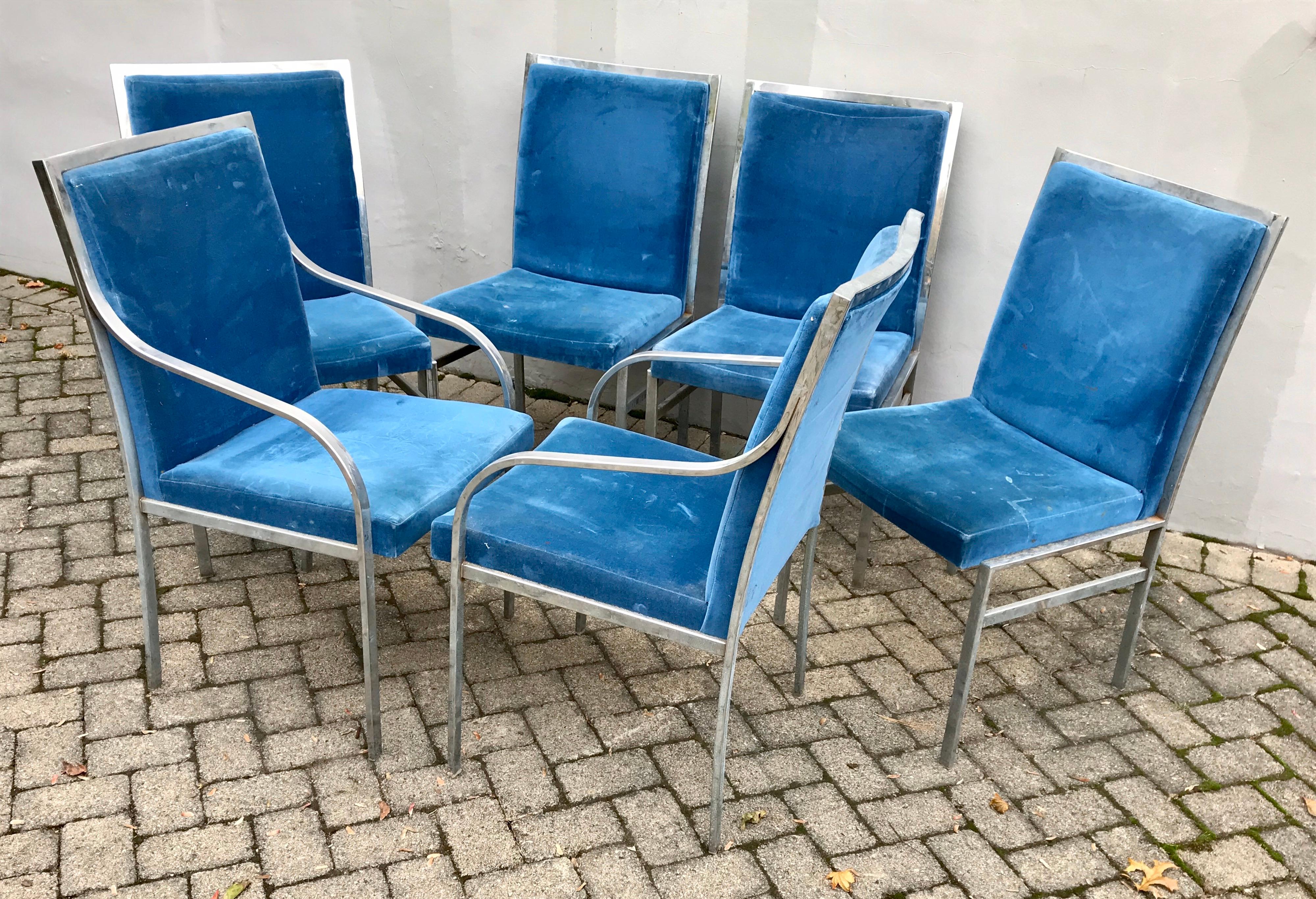 Set of six dining chairs designed by the French designer Pierre Cardin for Dillingham. The set includes two armchairs and four side chairs. Sleek mid century chrome frames with blue velvet upholstery. Two armchairs have curved arm design.

Pierre