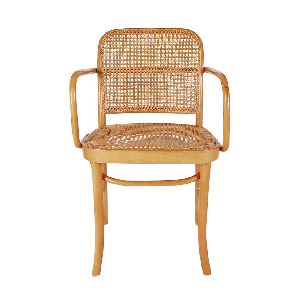 The caning is absolutely beautiful on this iconic set of Prague dining chairs originally designed by Josef Frank & Josef Hoffmann in the 1920s. These very well made vintage chairs were manufactured in the 1970s in Poland. They feature minimal