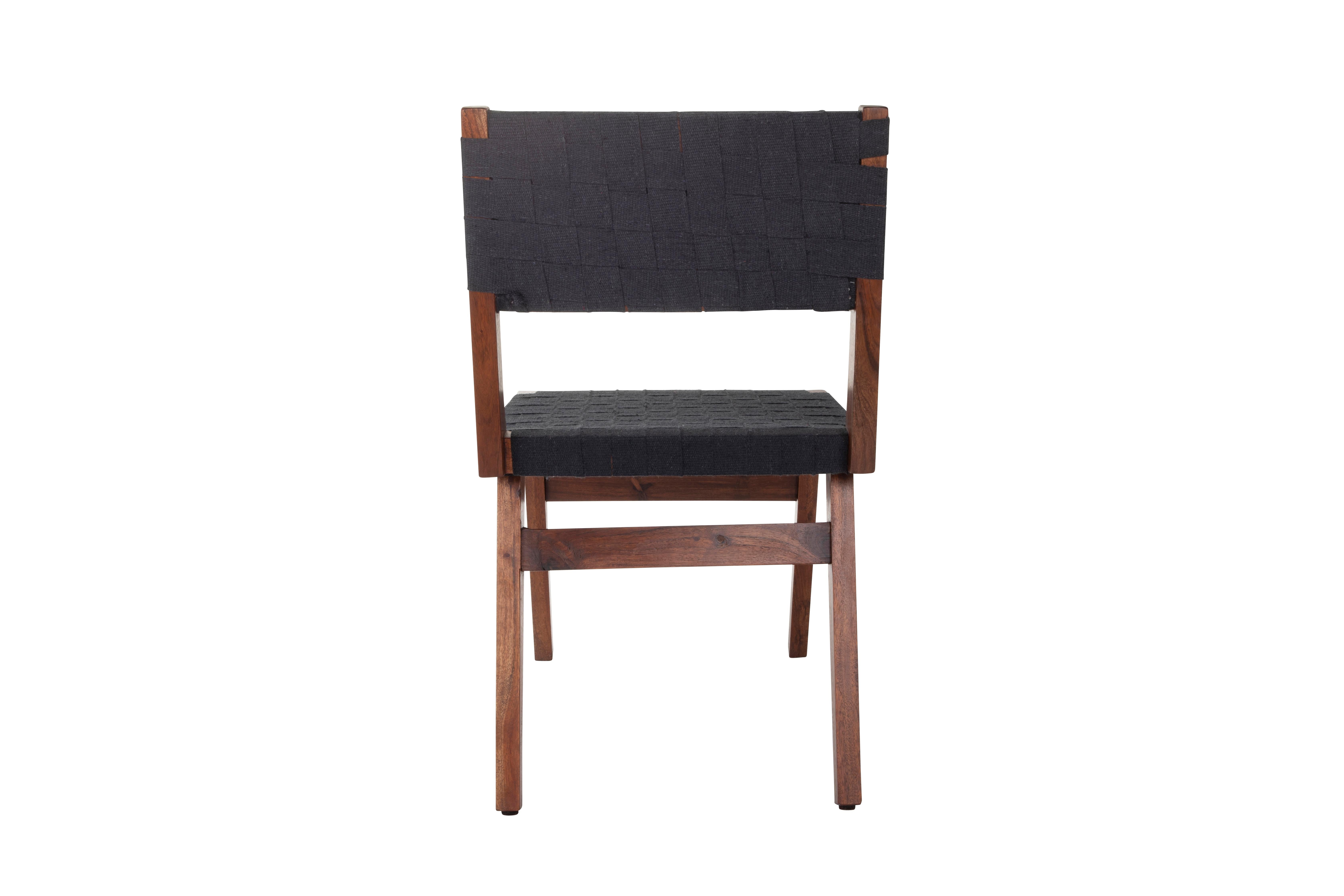 This mid-century modern style set of six dining chairs. Features hand-woven canvas straps and a wooden frame. Chairs are in very good condition with minor wear.

The piece is a part of our one-of-a-kind collection, Le Monde. Exclusive to us.