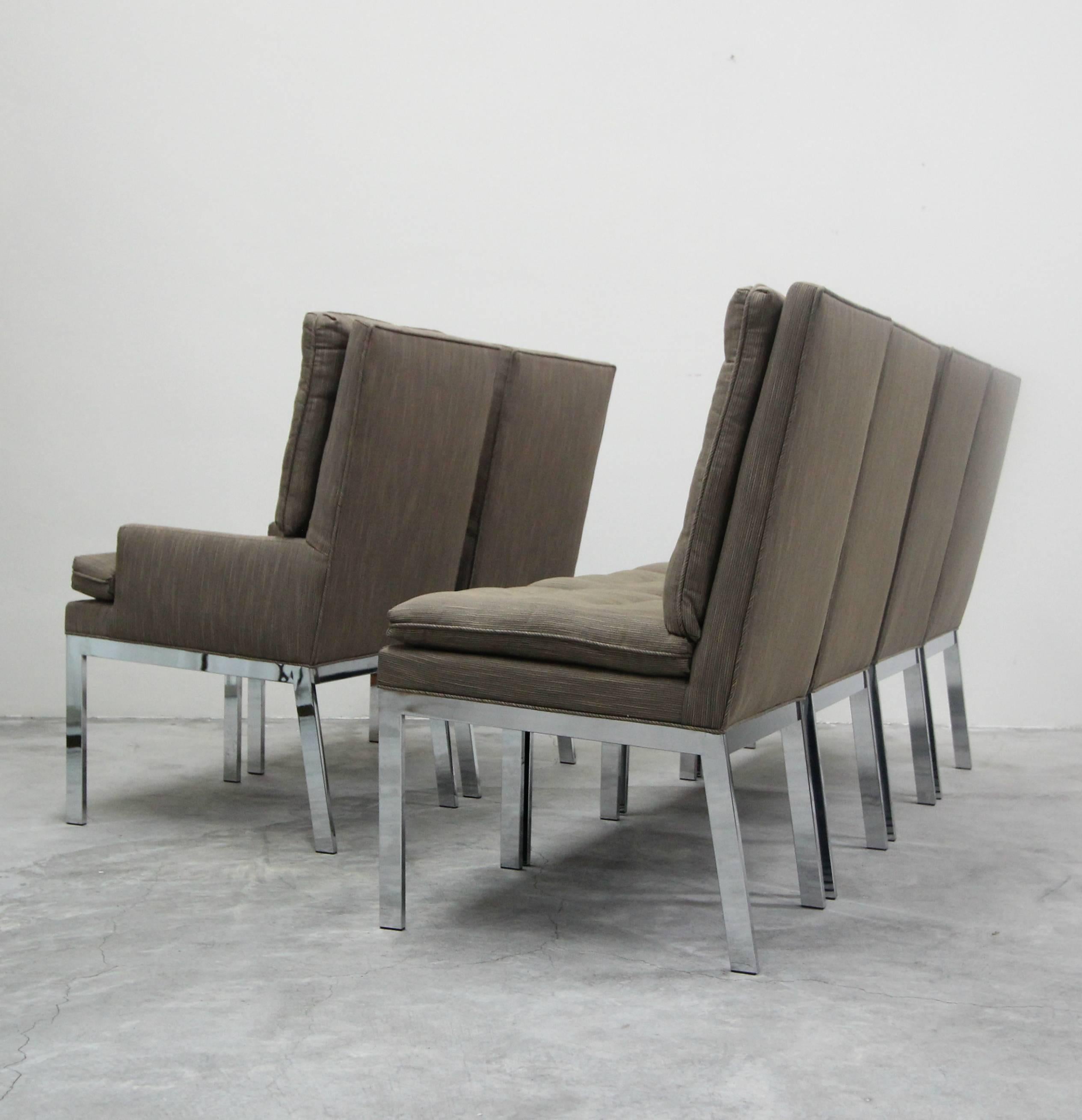 Exquisite set of chrome dining chairs designed by Milo Baughman for Design Institute America (DIA). Mirrored chrome, modern beauties. Nicely angled legs. Recently upholstered, upholstery is in good used condition overall.