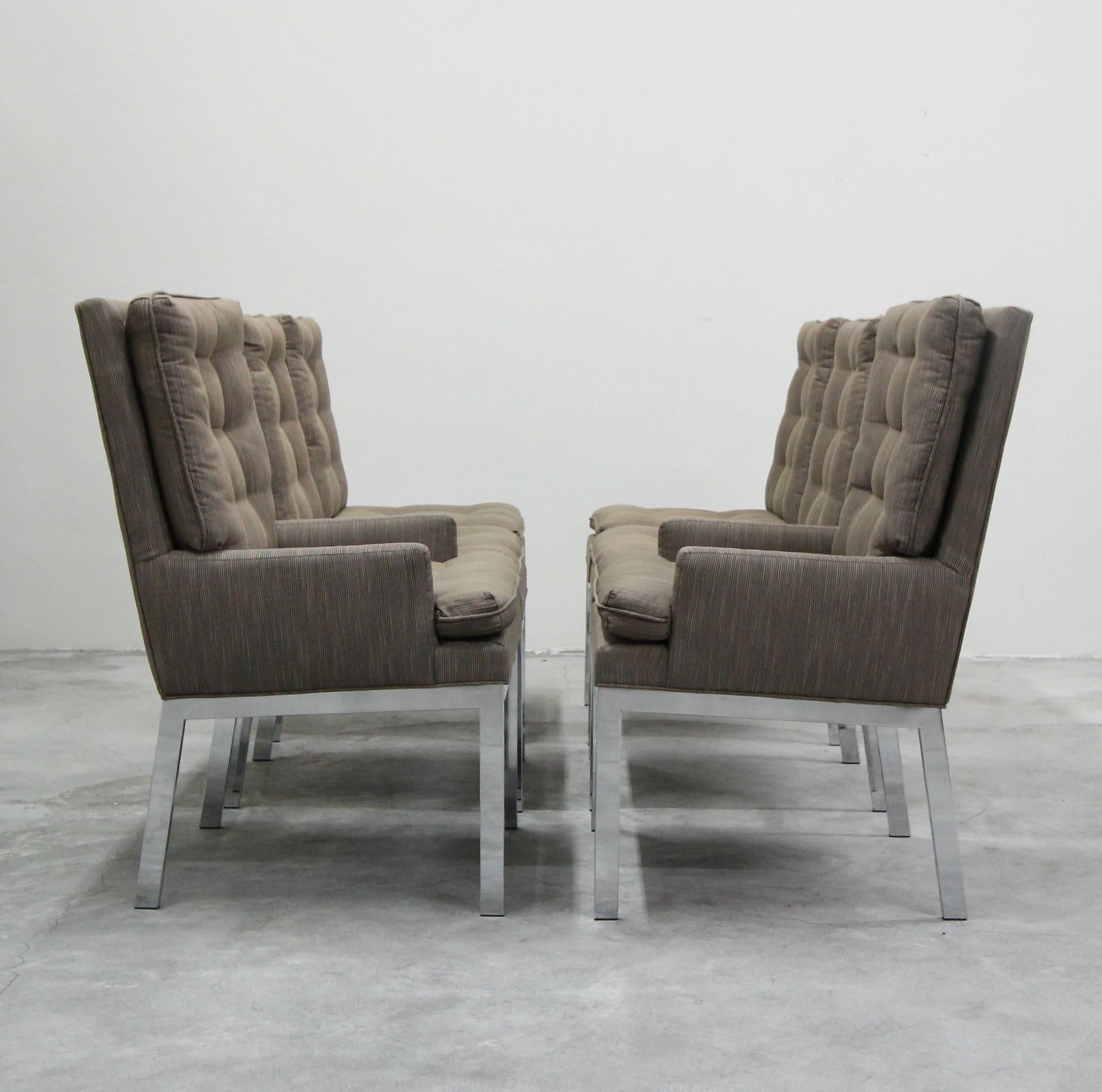 Exquisite set of chrome dining chairs designed by Milo Baughman for Design Institute America (DIA). Mirrored chrome, modern beauties. Nicely angled legs. Recently upholstered, upholstery is in good used condition overall.