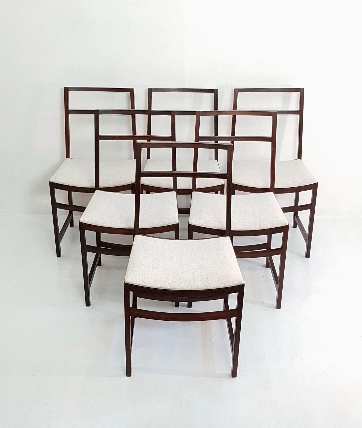 Midcentury set of 6 lightweight and sturdy chairs designed by Renato Venturi for MIM (Mobili Italiani Moderni) with beautifully reupholstered seats in Italian salt and pepper virgin wool. Marked underneath each chair with the famous brand name MIM.