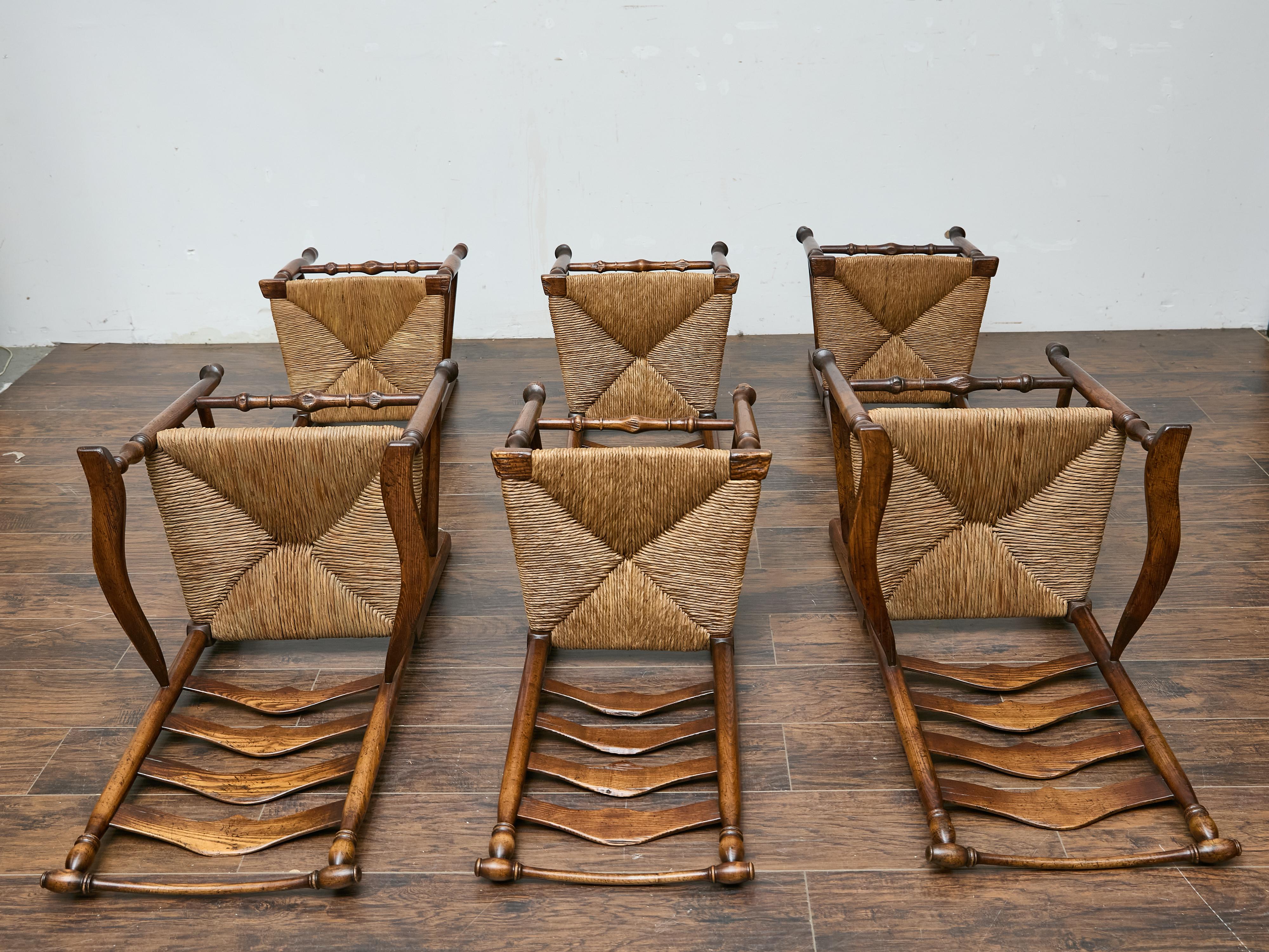 Set of Six Midcentury Ladder-Back Dining Room Chairs with Rush Seats In Good Condition In Atlanta, GA