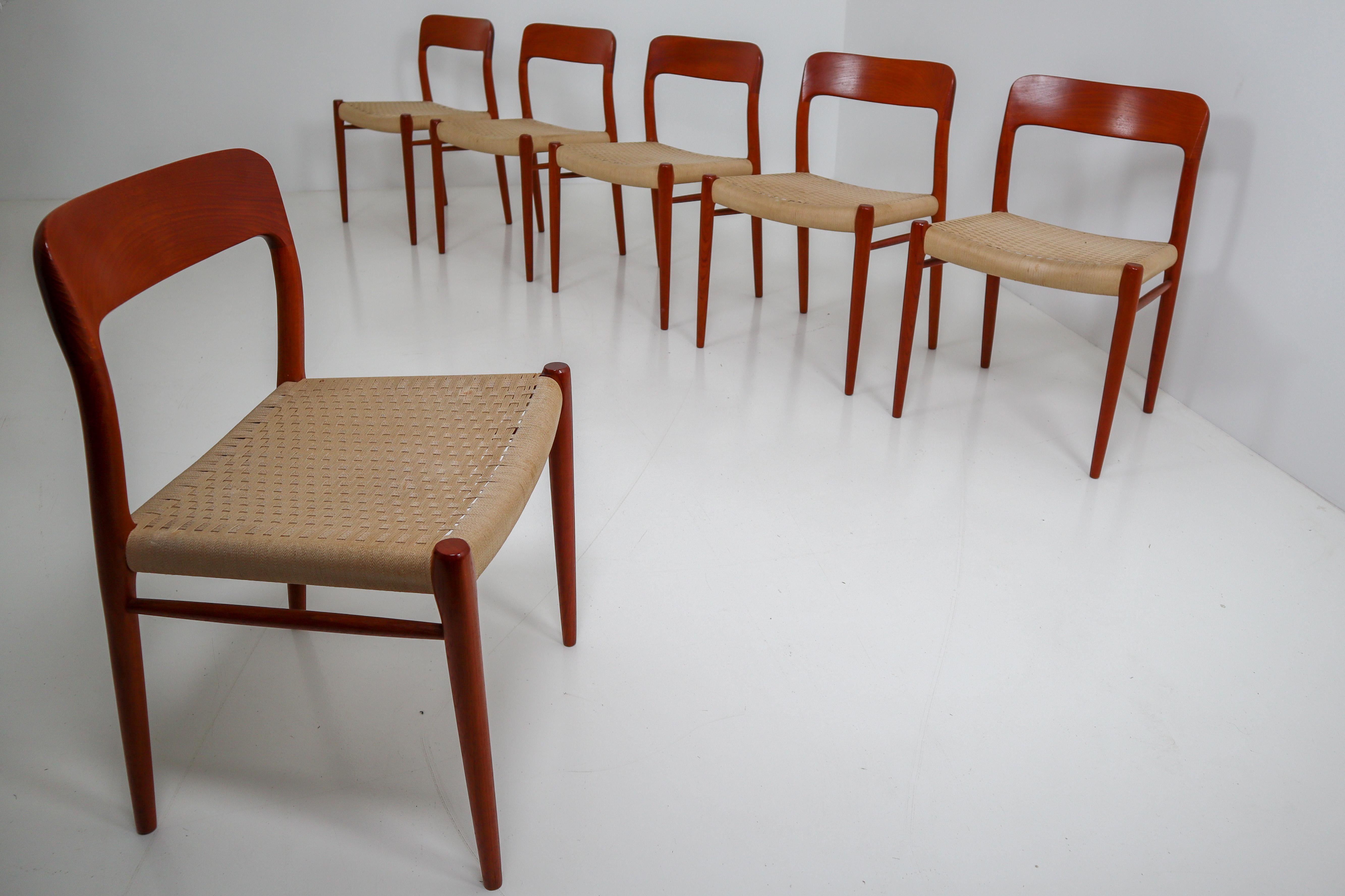 Set of six midcentury dining chairs model 75 - one of the all-time great dining chairs to come out of the midcentury era and as popular as ever. Designed in 1954 by Niels O. Møller for J. L.Møllers Møbelfabrik,. Made from solid teak and seats of
