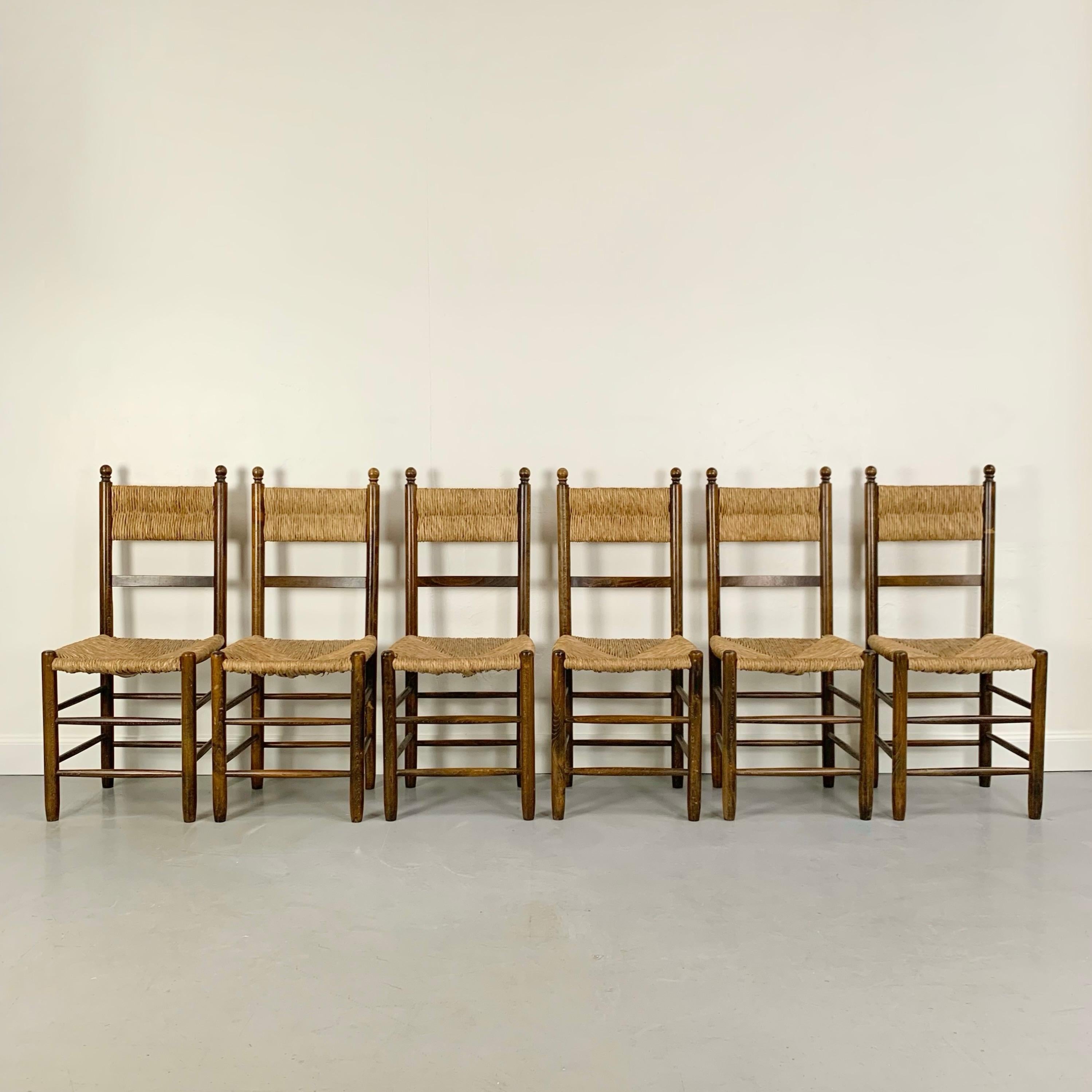 Mid-Century moderno Set di sei sedie in quercia e paglia del Medioevo, circa 1960, Francia. in vendita