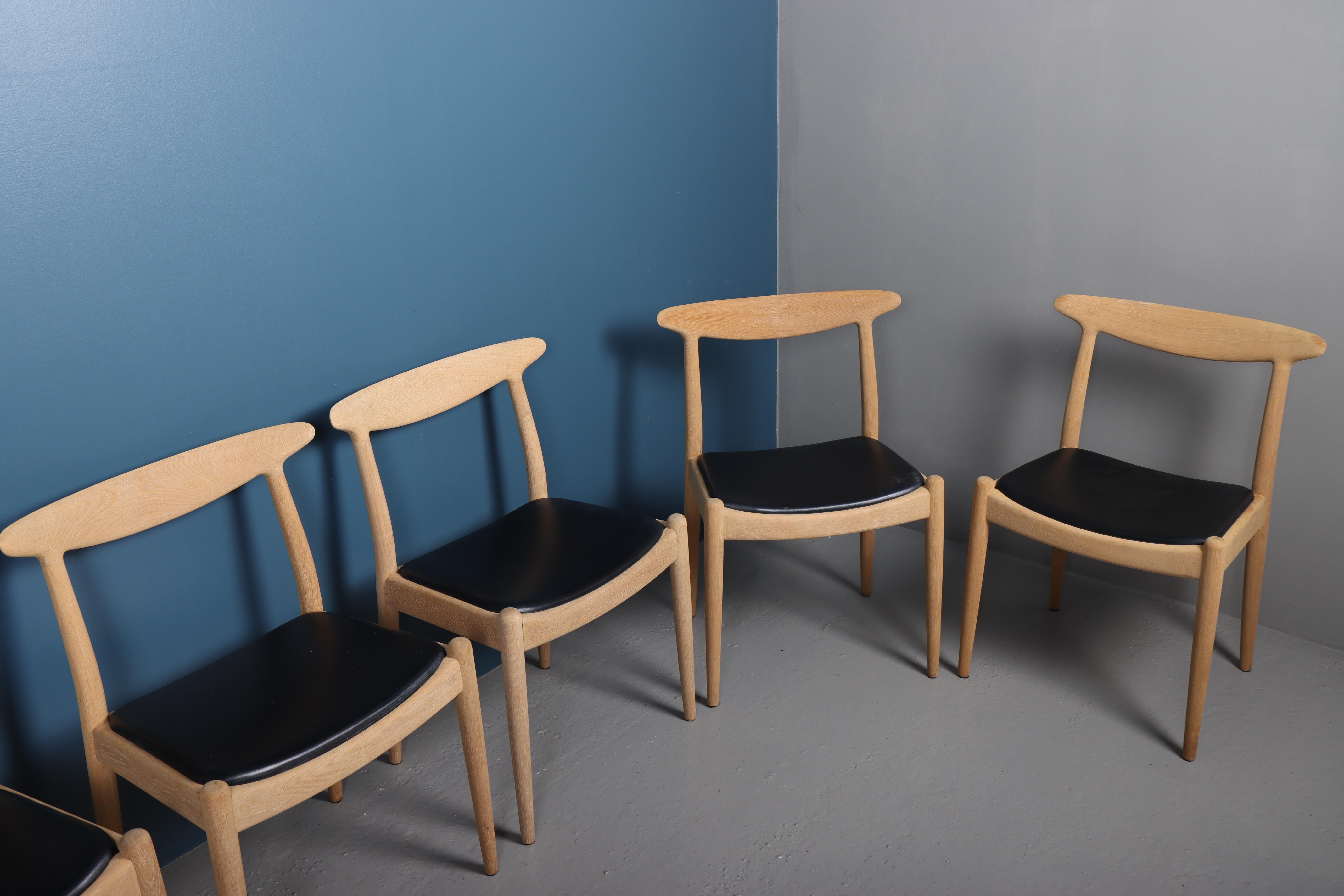 Danish Set of Six Midcentury Side Chairs in Oak and Patinated Leather by Hans Wegner For Sale