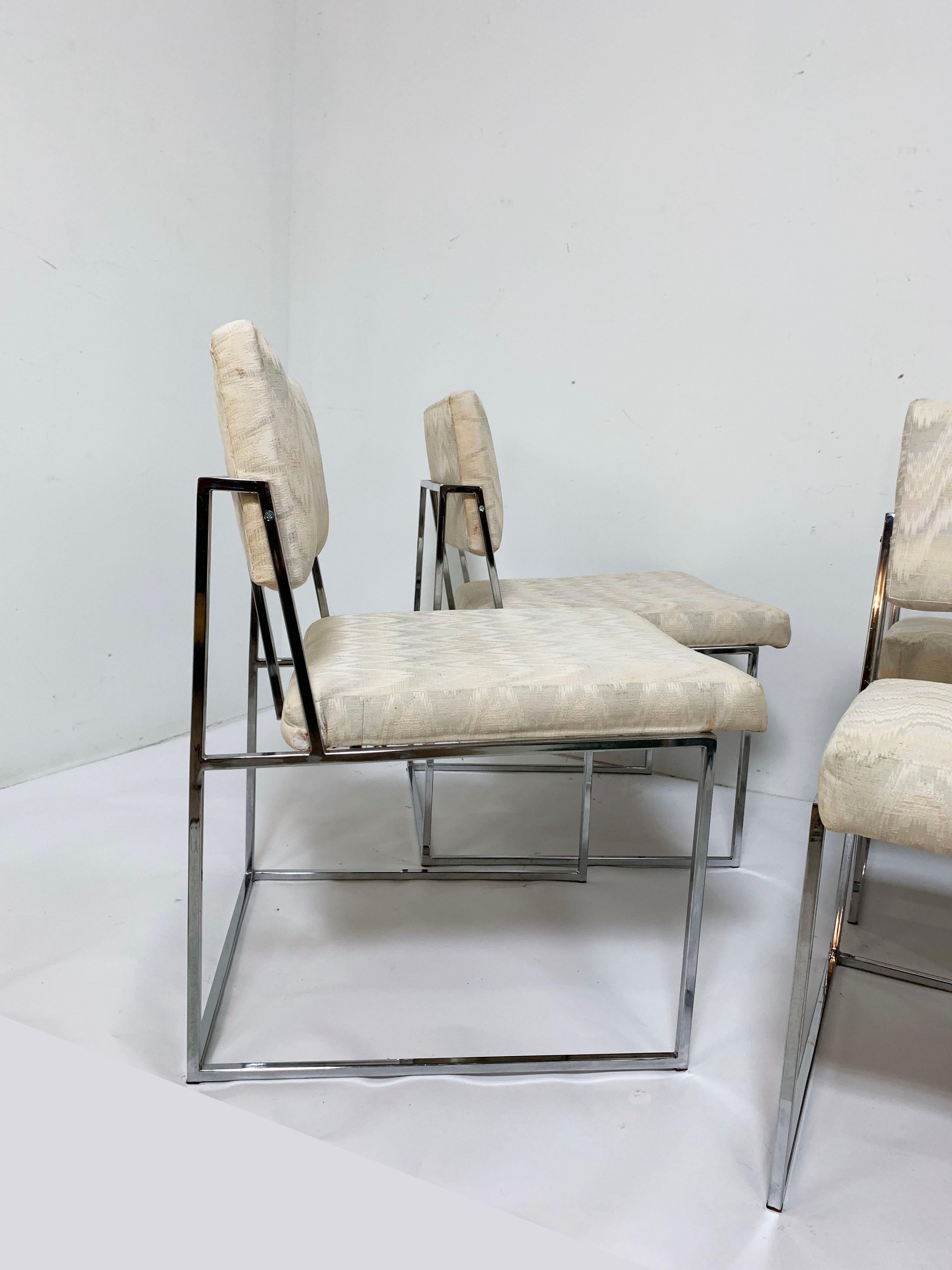 A set of 6 (model 1188-110) Thayer Coggin dining chairs in chromed steel. This rarer design by Milo Baughman, with its distinctive trapezoidal side panel, first appeared in 1968, three years before his now Classic model 1187 chair was released. With