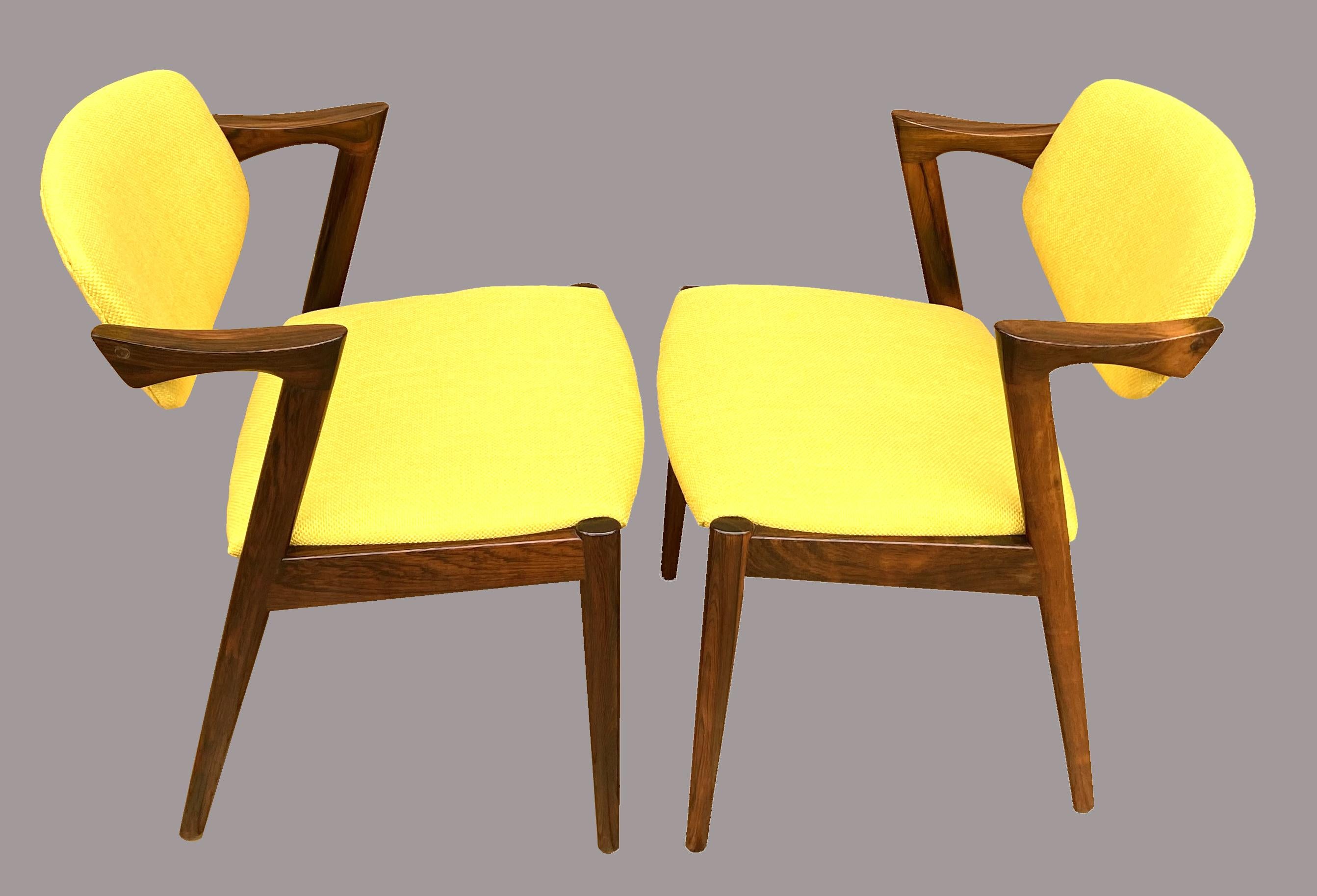 These chairs are made from Santos Rosewood, with wonderfully marked grain on the solid arms and legs, They are all in excellent original condition, the only thing that has been done to them is that they have been freshly recovered in good quality