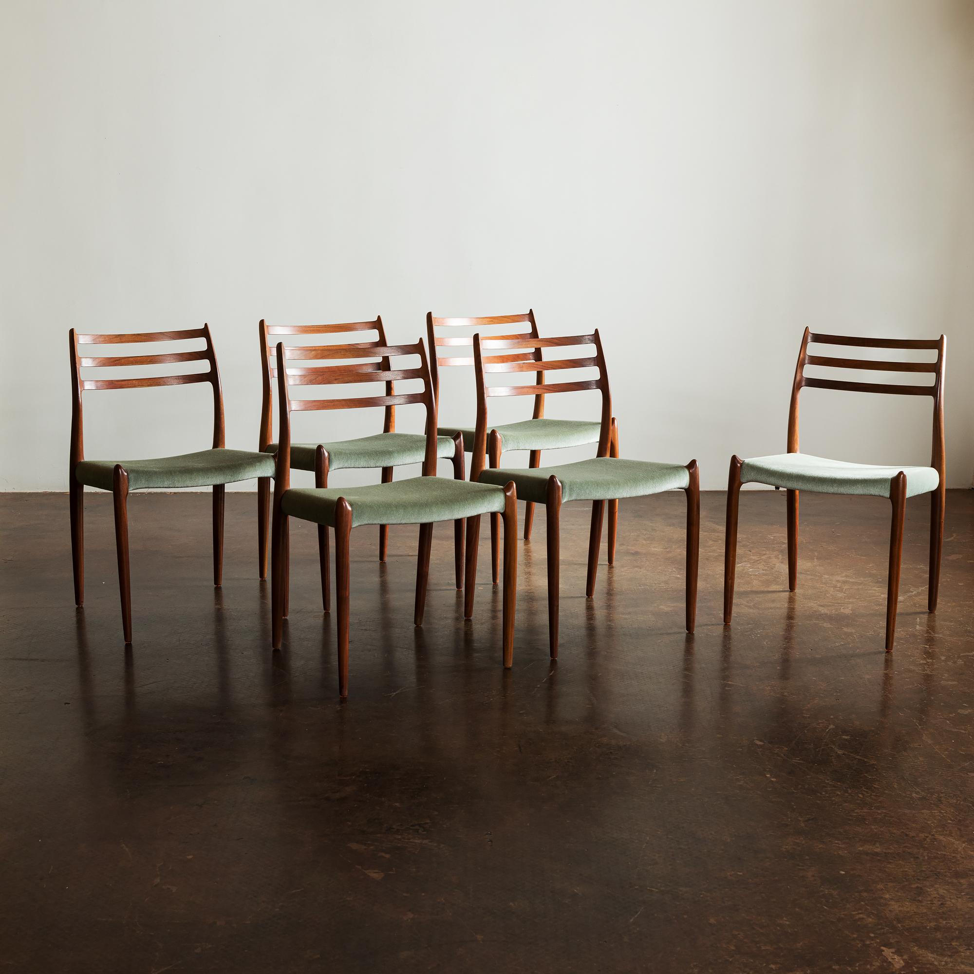 A handsome set of six rosewood N.O. Møller 78 dining chairs, designed in 1962 for J.L. Møllers Møbelfabrik.