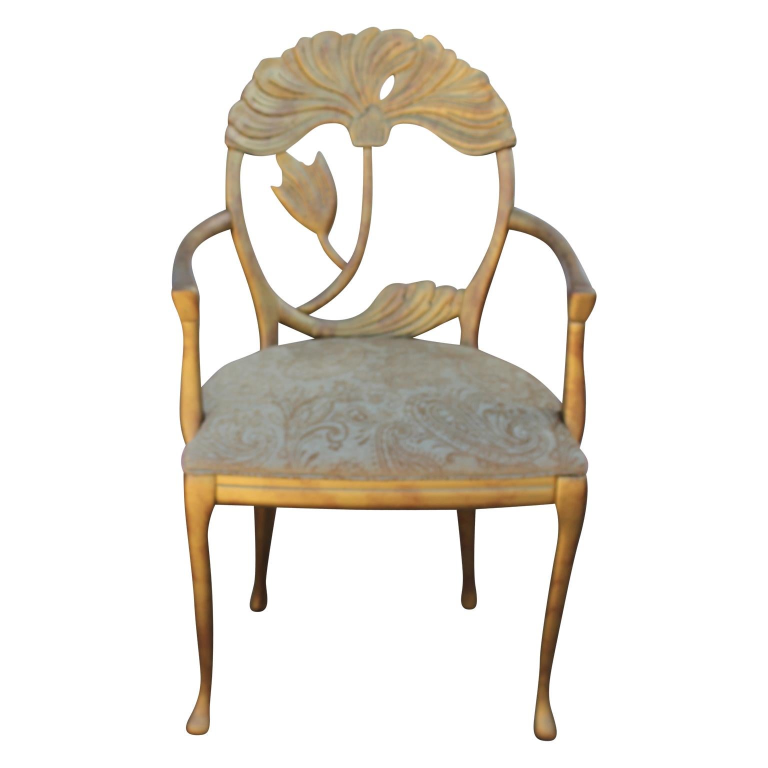 A set of six beautiful Italian Art Nouveau floral-back gold dining chairs. Intricate floral design will be a conversation starter at any dinner party. This set features two chairs with arms and four without.

Dimensions of two chairs with arms:
D
