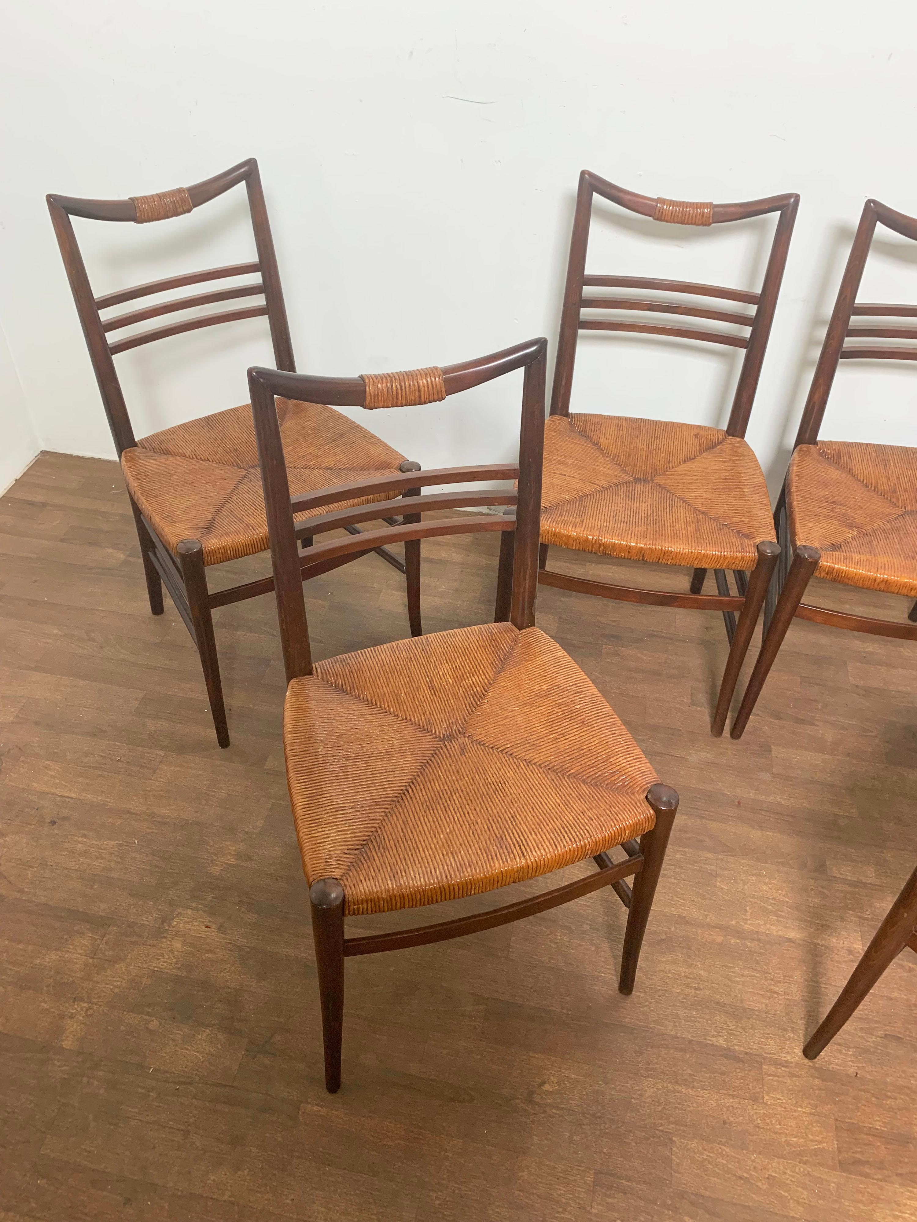 Set of six mid century Italian dining chairs with corded seats made for Otto Gerdau, ca. 1950s.