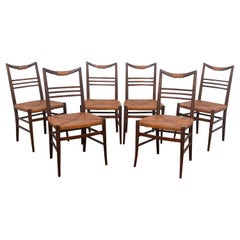 Set of Six Modernist Italian Rattan Dining Chairs, Circa 1950s