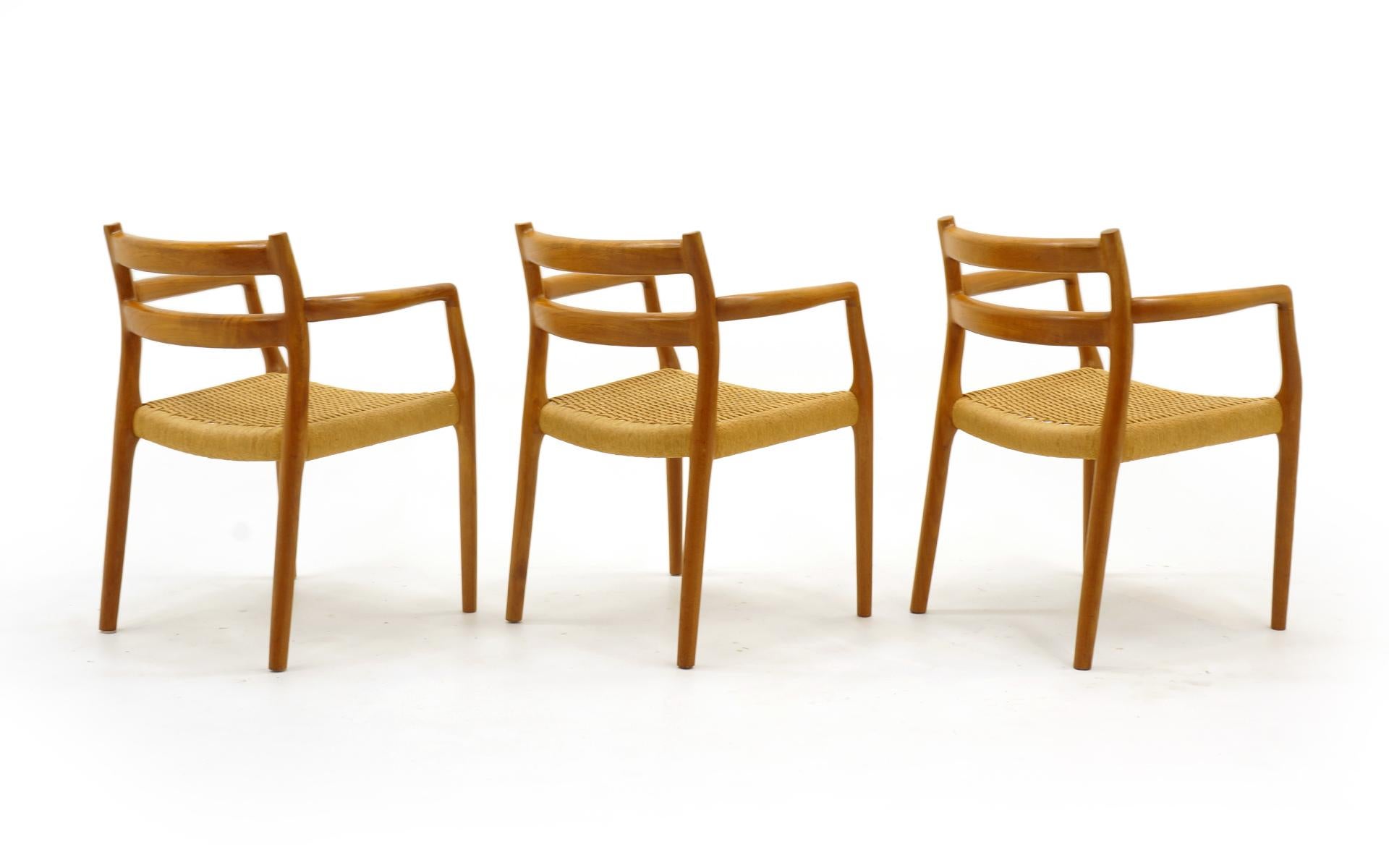 Set of Six Moller Dining Chairs, All Armchairs, Teak and Paper Cord Seats In Good Condition In Kansas City, MO