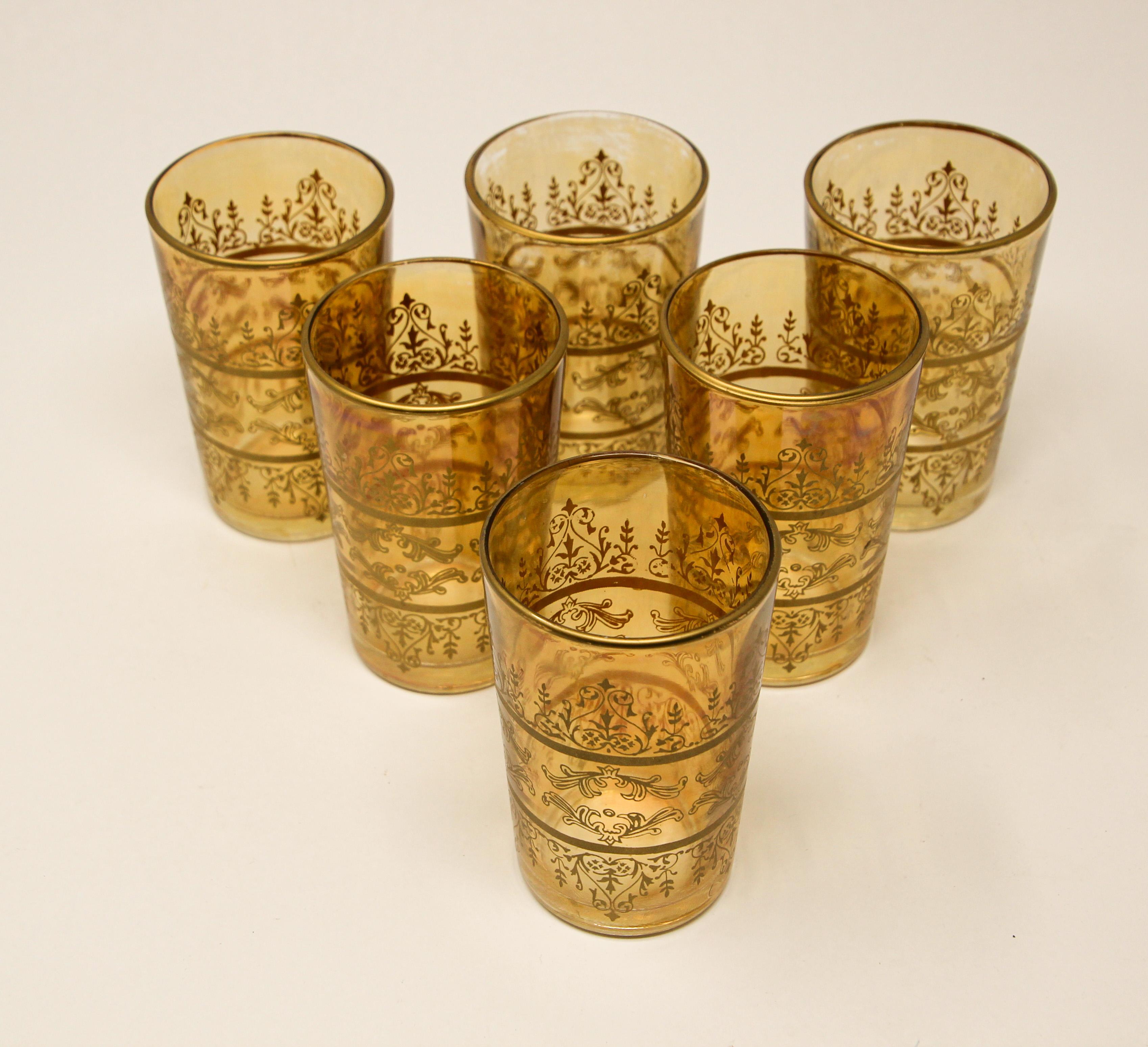 Set of six Moorish drinking glasses with gold and amber design
Decorated with a gold pattern Moorish frieze.
Use these elegant glasses for Moroccan tea, or any hot or cold drink.
Great barware statement, perfect for the holidays and gorgeous on