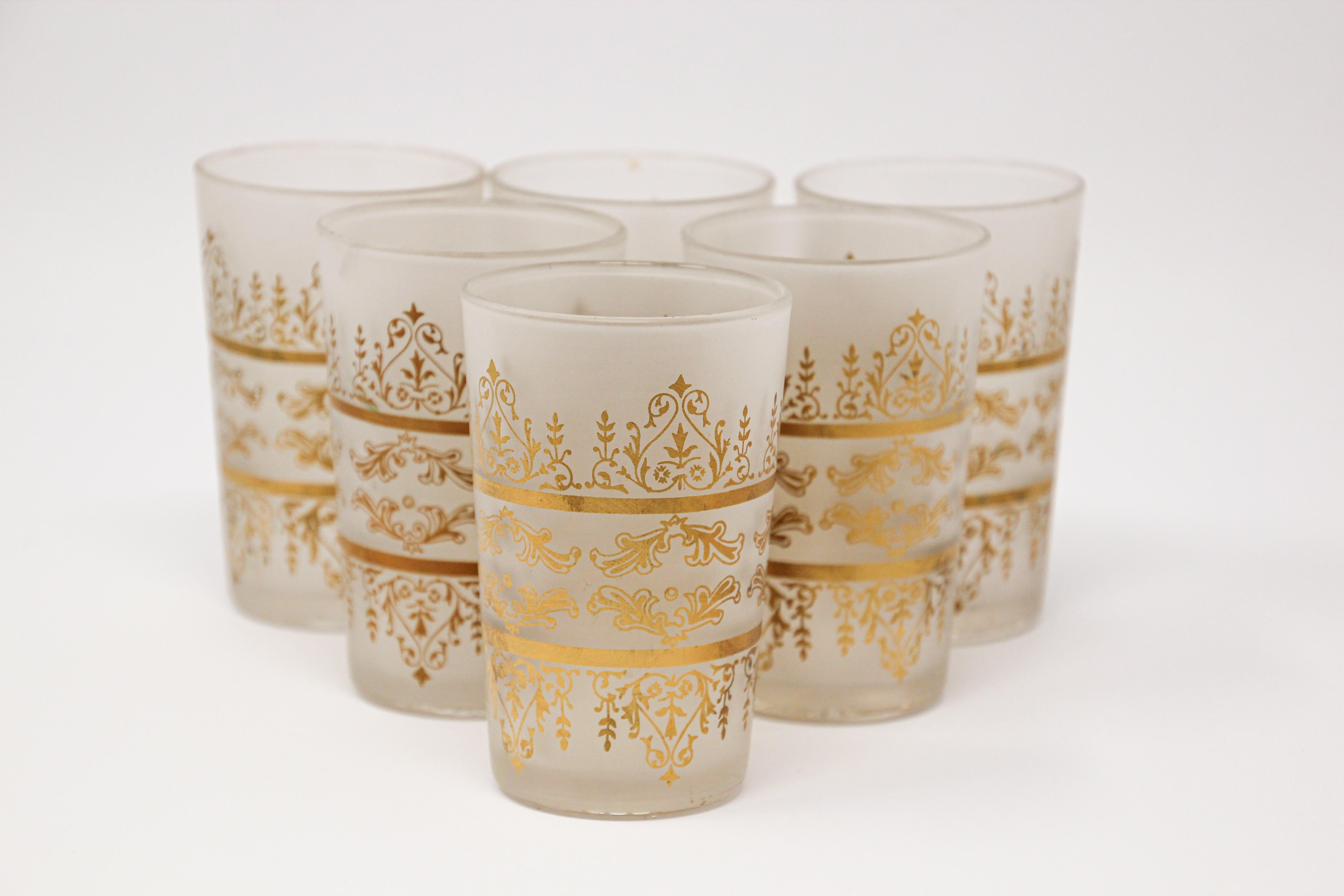 Set of 6 Moroccan opaline white and gold glasses.
Set of Six Moroccan Moorish White Frosted and Gold Glasses
Decorated with a classical traditional Moorish pattern gold frieze overlay.
Use these elegant glasses for Moroccan tea, or any hot or cold