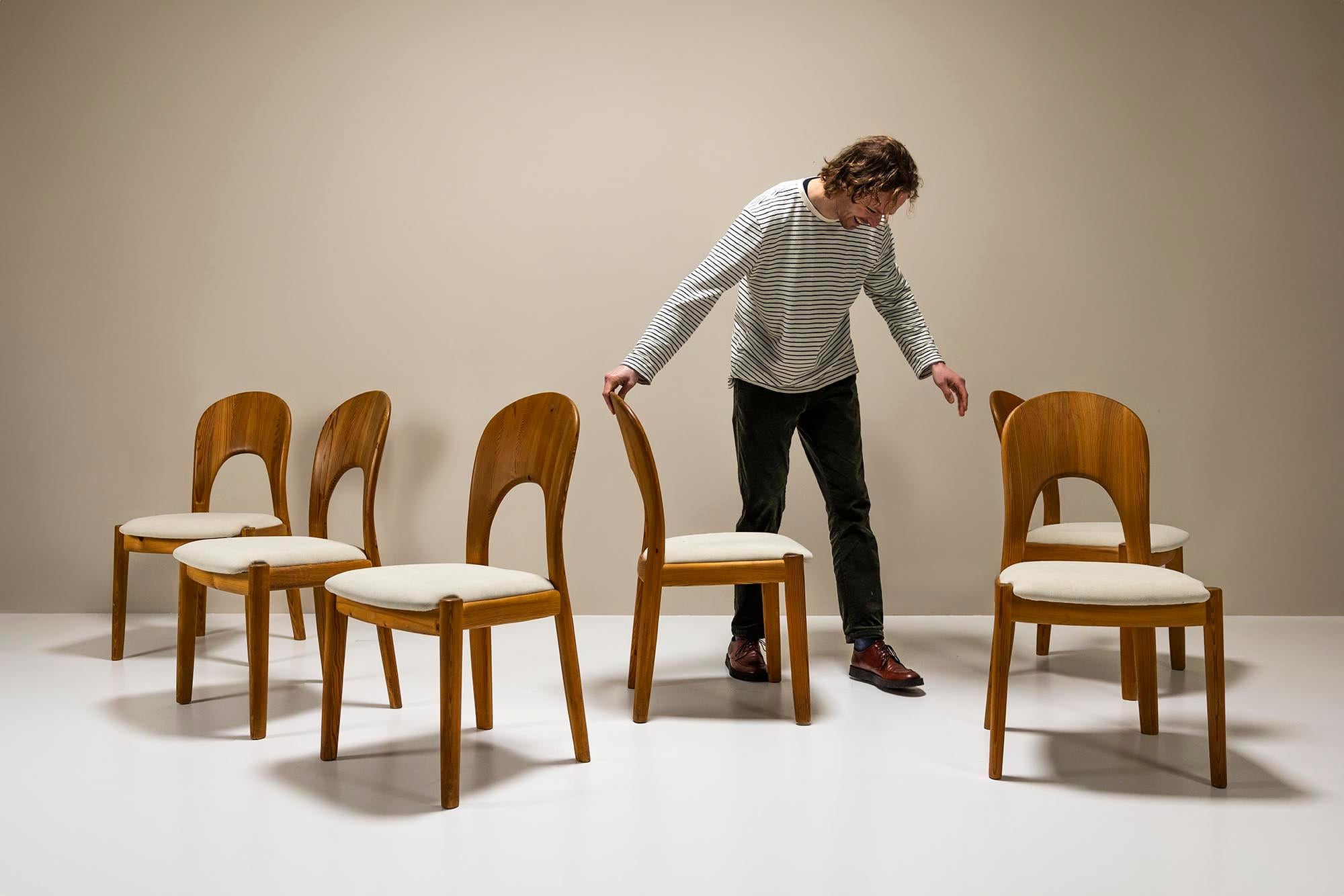 Set of six dining chairs in solid teak by Niels Koefoed, model ‘Morten'. This set of attractive dining chairs is made of solid teak. A remarkable and very characteristic feature of this design is the backrest. This has a sloping shape and is