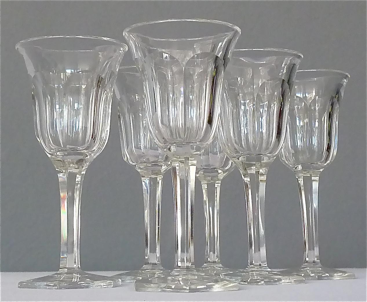 Beautiful set of six faceted crystal liquor glasses made by Moser, Austria, circa 1920. The precious Art Deco glasses are hand-cut and have a hexagonal stand. They stay in very good original condition with no defects or later alterations. They are