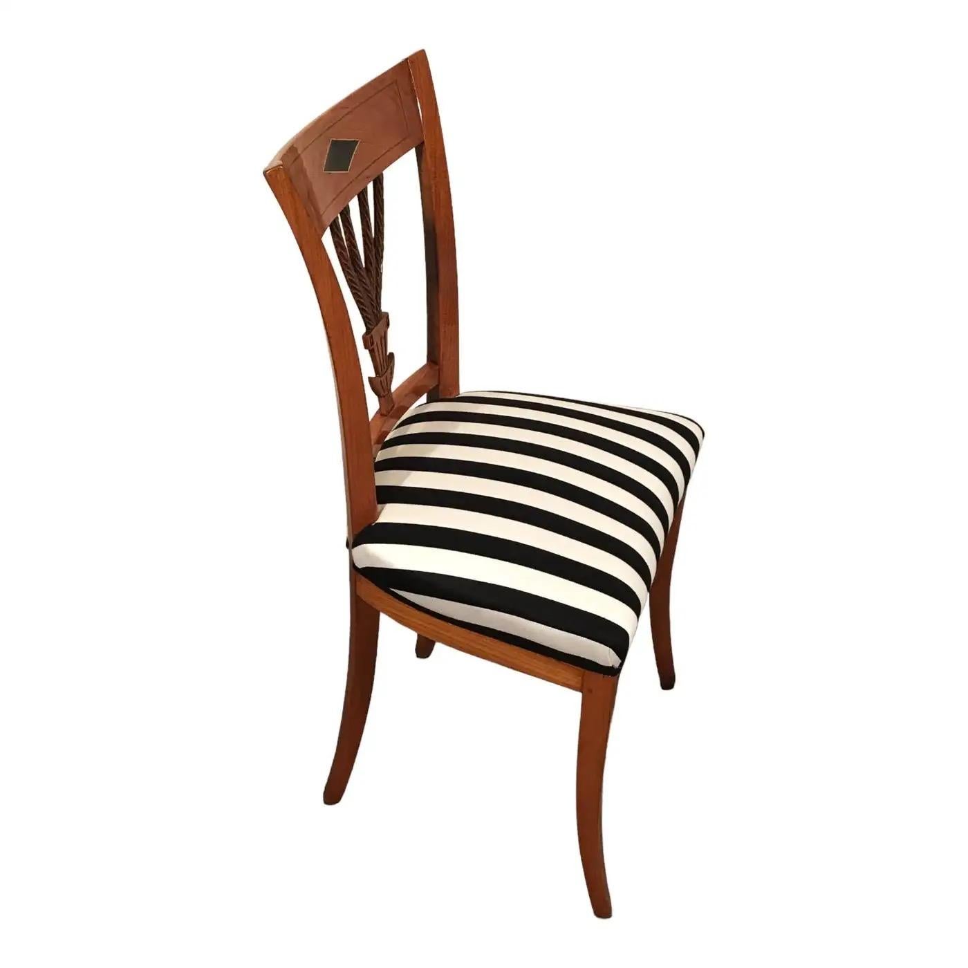 Set of Six Neoclassical Chairs
Beautifully designed set of six Neoclassical chairs dating back to around 1810-30. The chairs come from Southwest Germany. The back has a very pretty open work design with a hand carved leave design. The Neoclassical