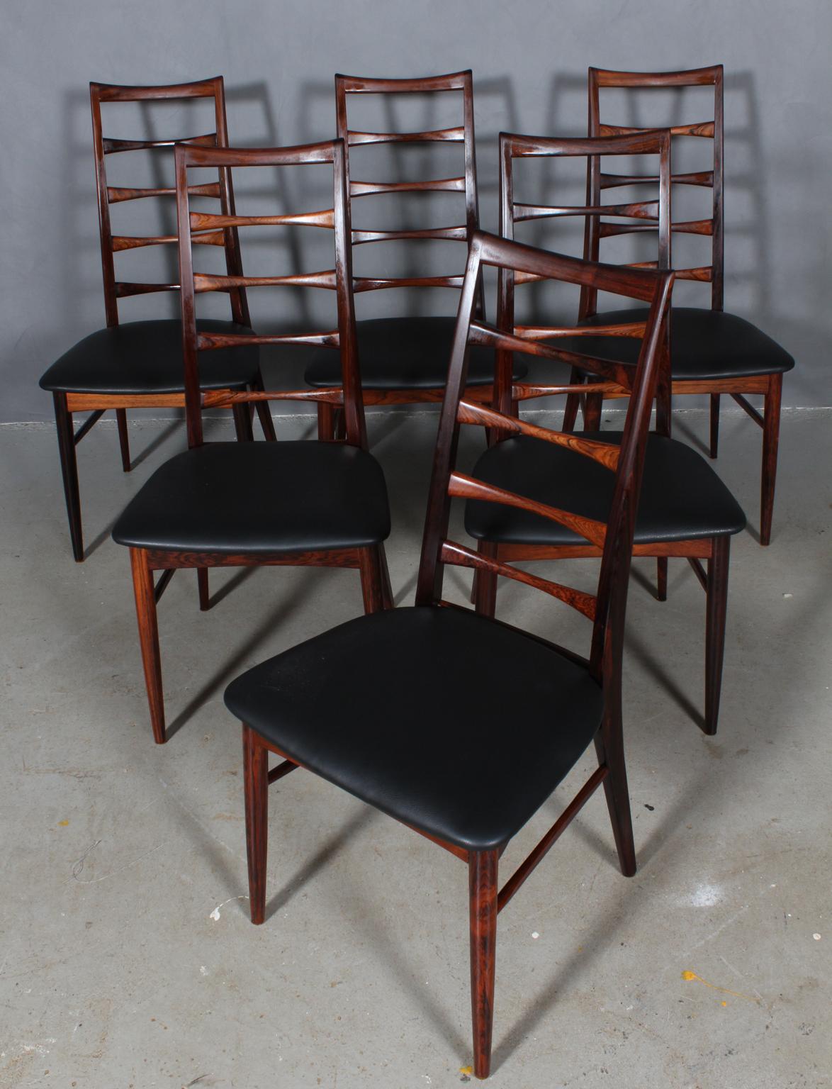 Set of six Niels Koefoed dining chairs made in solid rosewood.

New upholstered in black aniline leather.

Model Lis, made by Niels Koefoeds Møbelfabrik Hornslet, 1960s.

Mathcing armchair available.