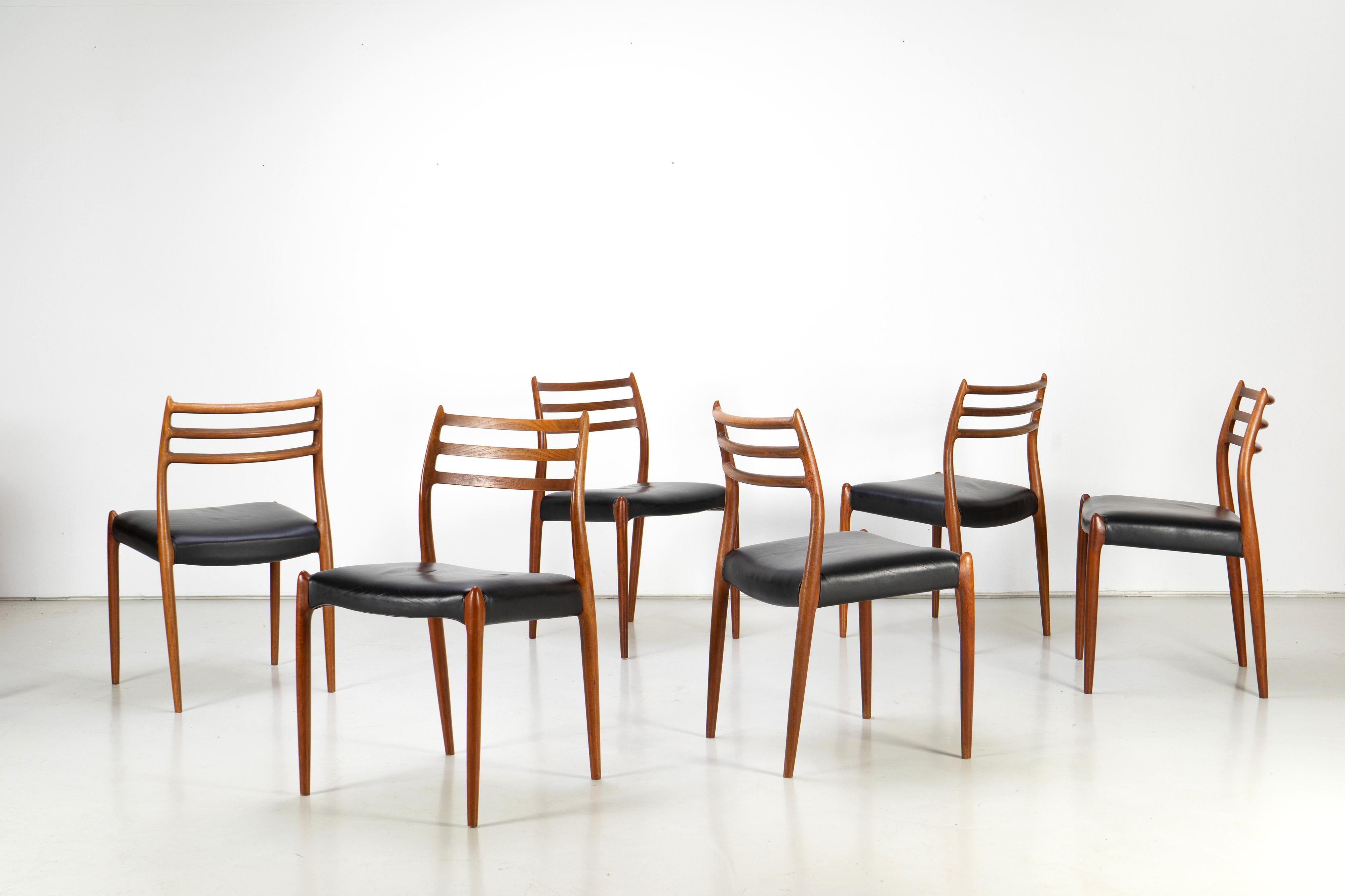 Set of six sophisticated dining chairs designed by Niels O. Møller. All chairs are of premium quality. The organic frames are made of real teakwood, upholstered with leather.