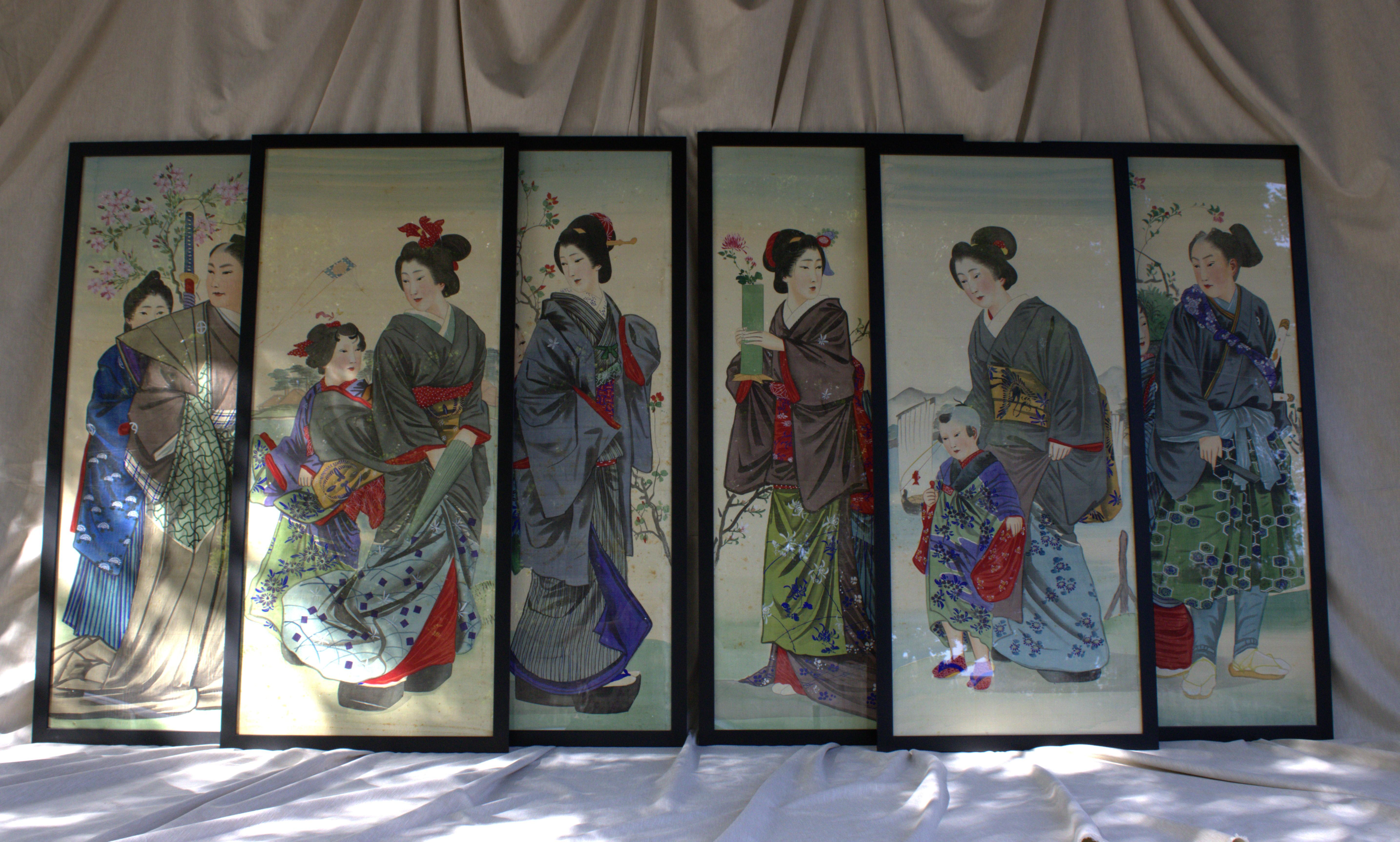 Set of six Japanese silk painting, in glass frames.

