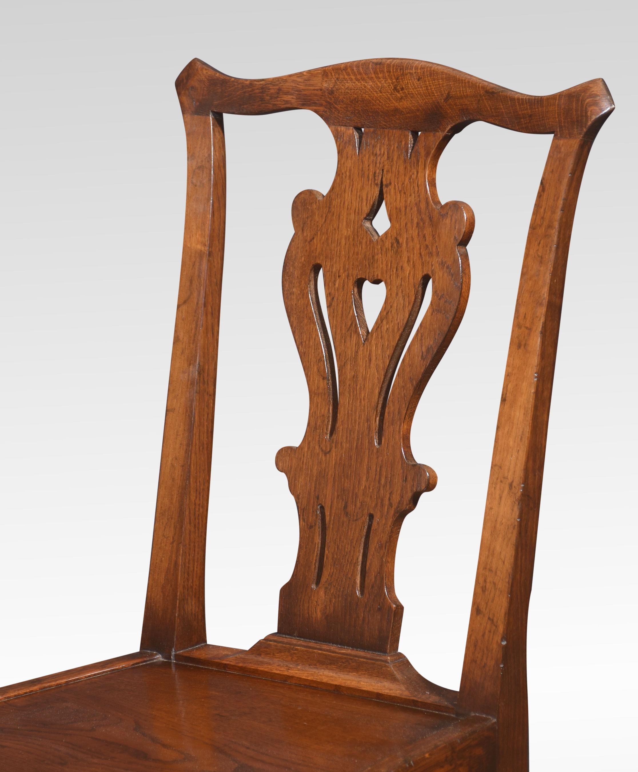 Set of six oak dining chairs, of 18th-century design having shaped top rail above-pierced splat backs. To the solid oak seats on chamfered and stretchered supports.
Dimensions
Height 38.5 Inches height to seat 18 Inches
Width 19.5 Inches
Depth 19