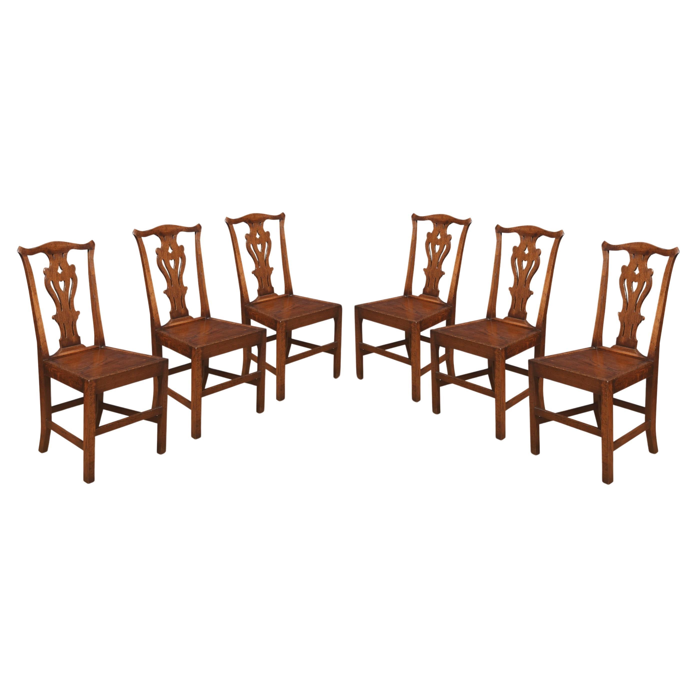 Set of six oak dining chairs For Sale
