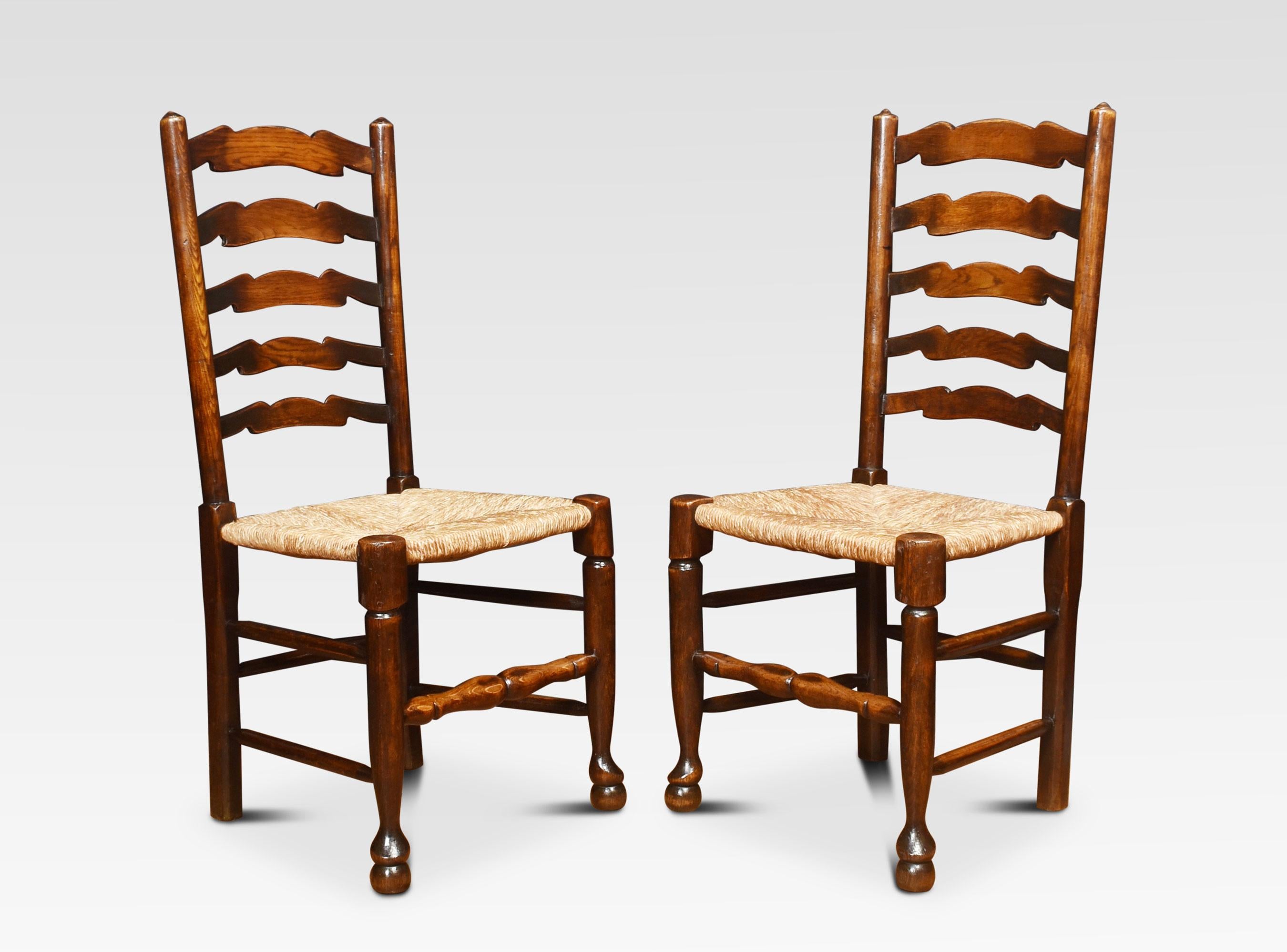 A set of six ladder back oak dining chairs, the ladder backs with rush seats on turned front legs united by stretchers.
Dimensions
Height 39.5 inches height to seat 18 inches
Width 19 inches
Depth 18 inches.