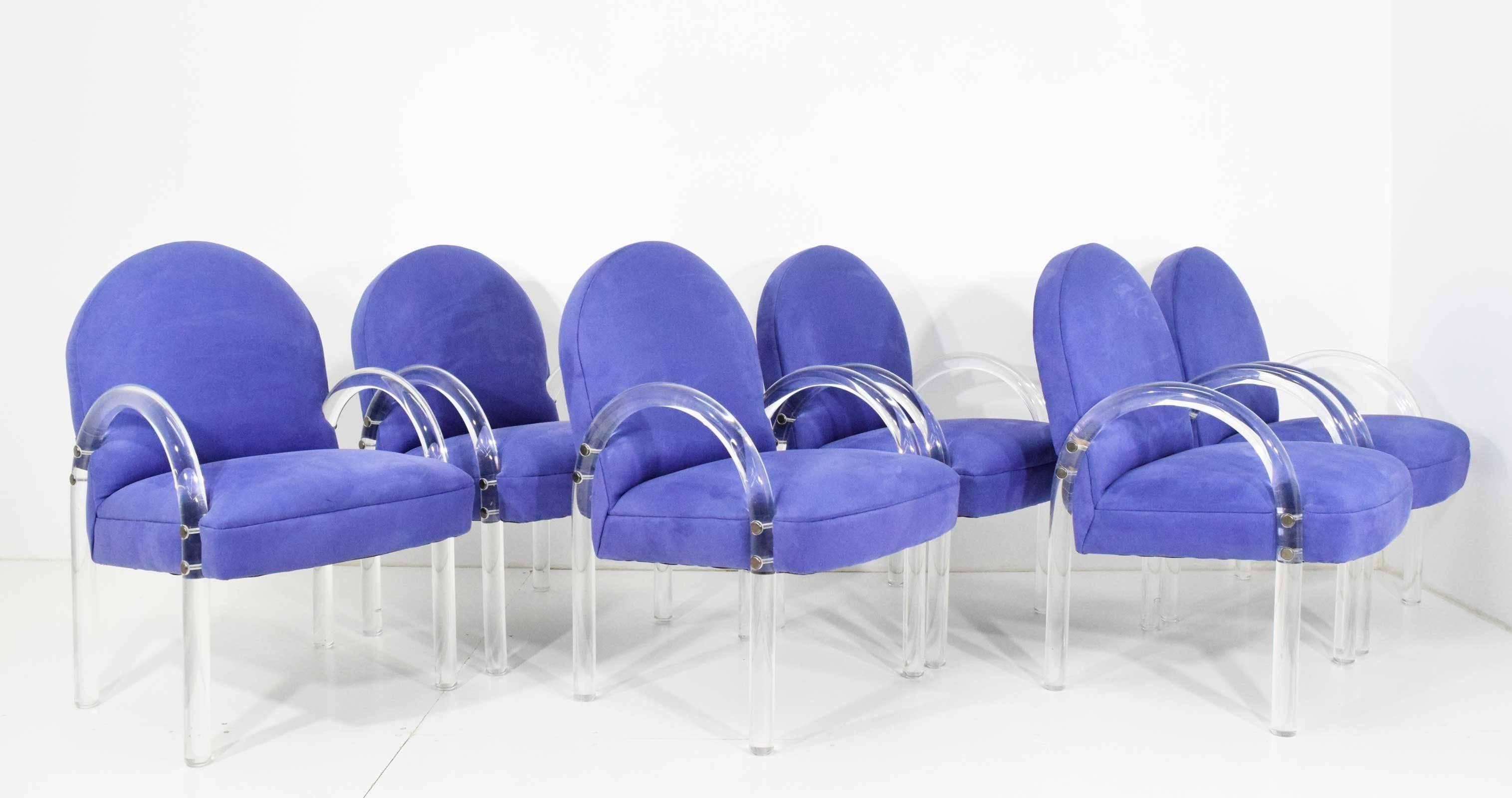 Chairs have curved Lucite arms and are upholstered in a rich lavender microfiber. Brass fittings. Upholstery is wonderful or you can change if you desire. Foam is great as well.