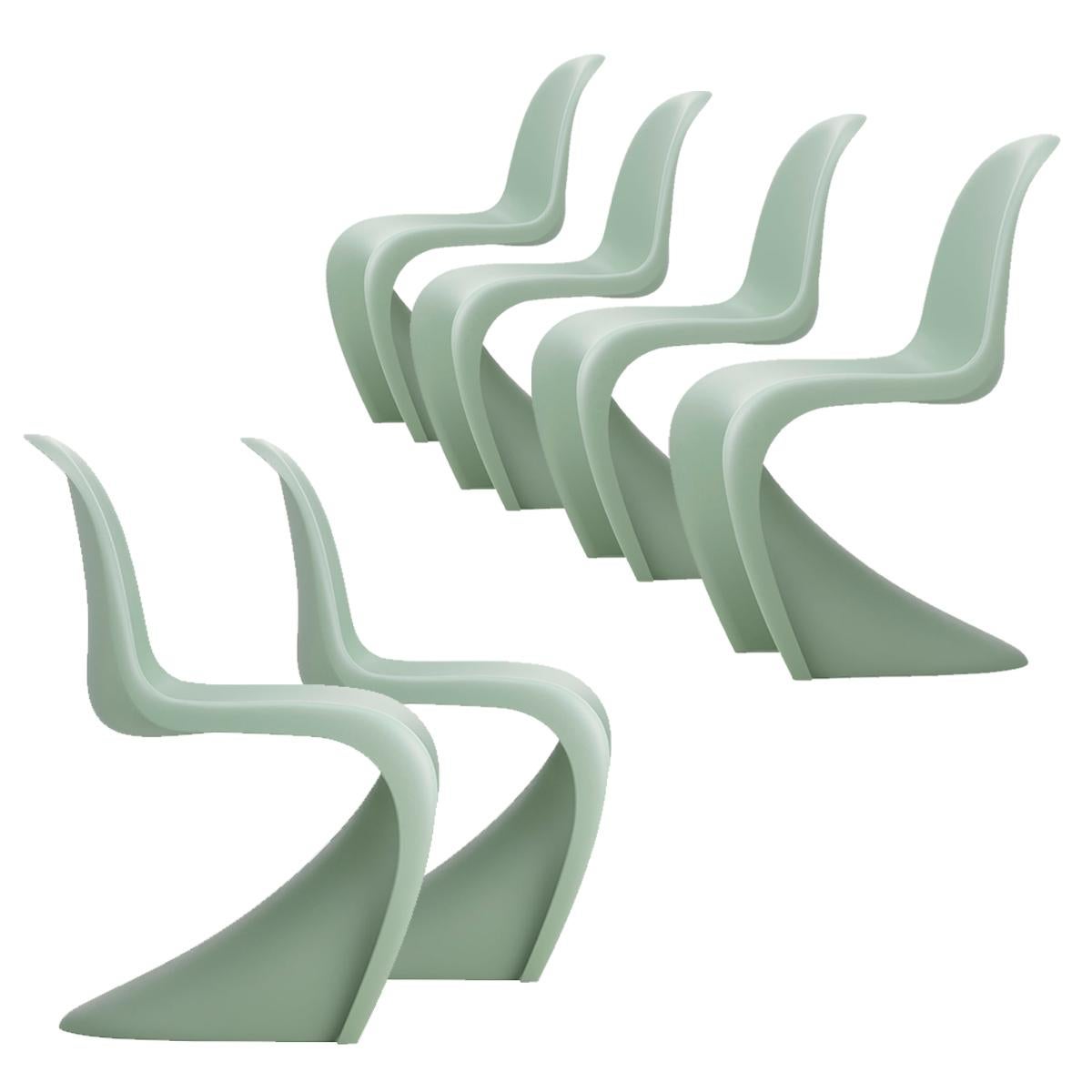 Chairs designed by Verner Panton in 1959/1999.
Manufactured by Vitra, Switzerland.

The Panton chair is a classic in the history of furniture design. Conceived by Verner Panton in 1960, the chair was developed for serial production in