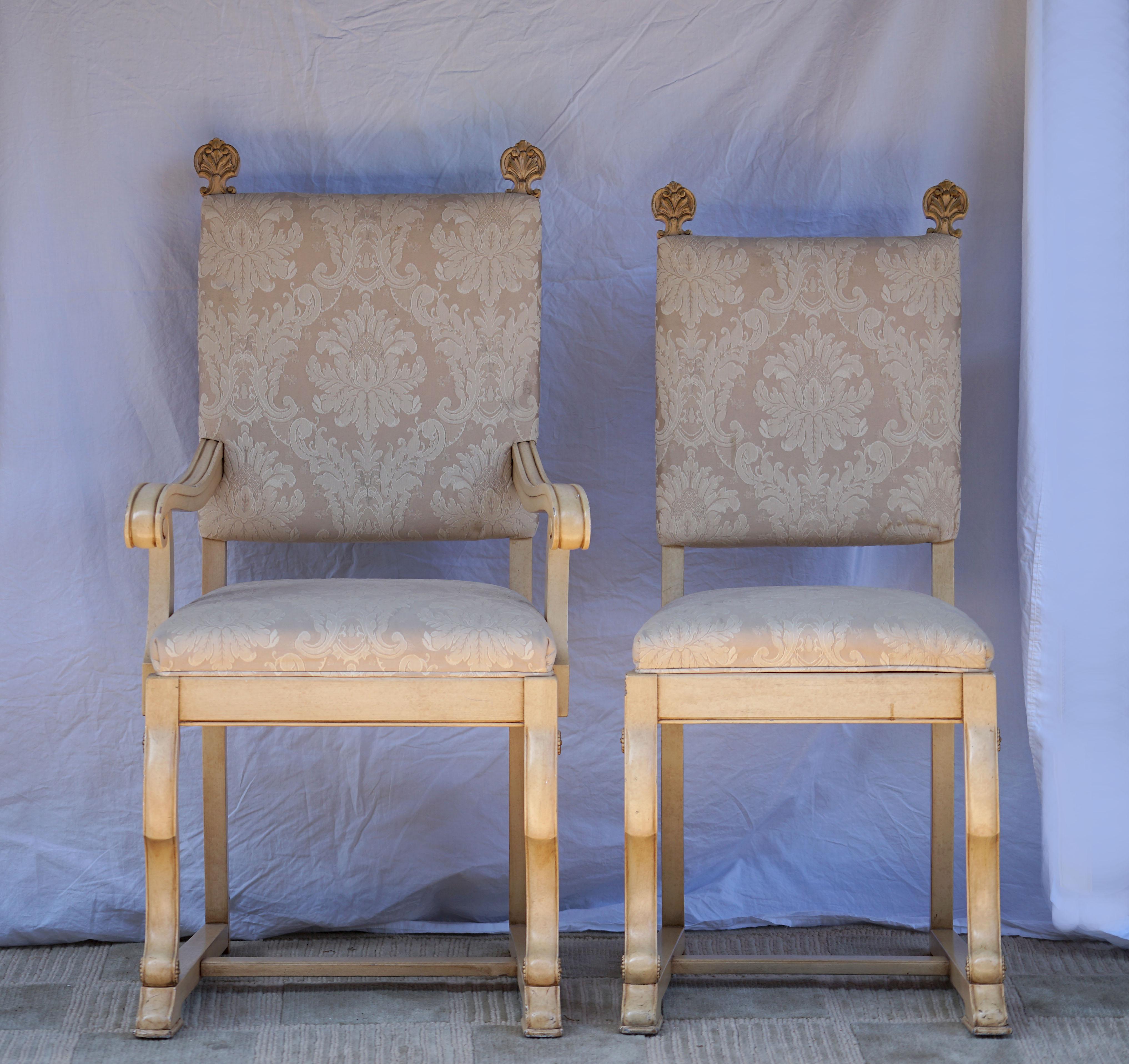 Elegance in the French taste describes this set of six vintage painted and parcel gilt dining chairs circa 1930 to 1950. The chairs have an elegant quality, but they also reflect the country surroundings of provincial design. The floor level