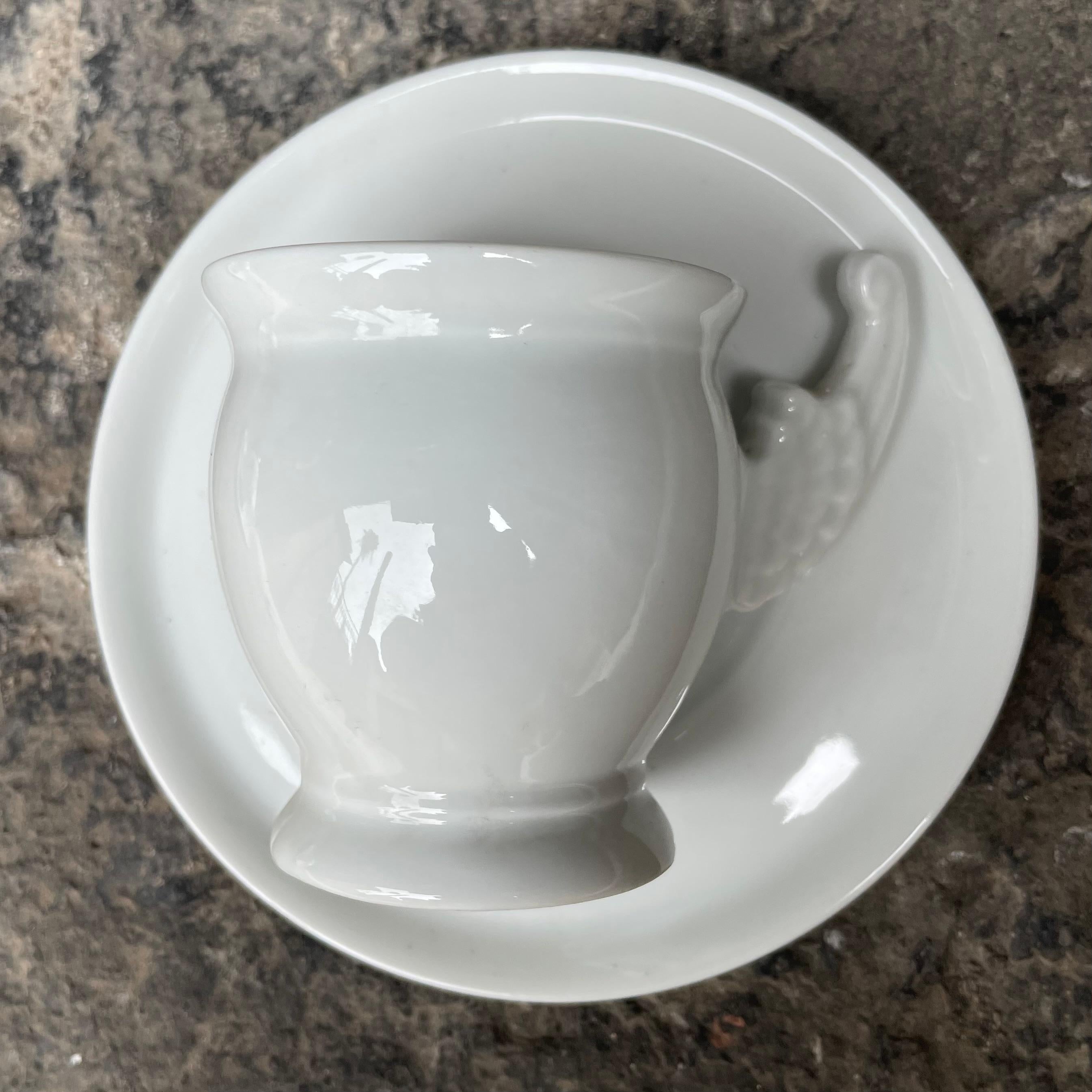 Juego de seis tazas de porcelana París Alas de Ángel siglo XX en venta