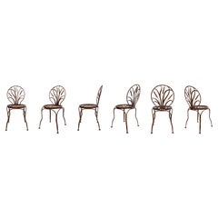 Antique Set of six patinated wrought iron chairs, France, late 19th century.