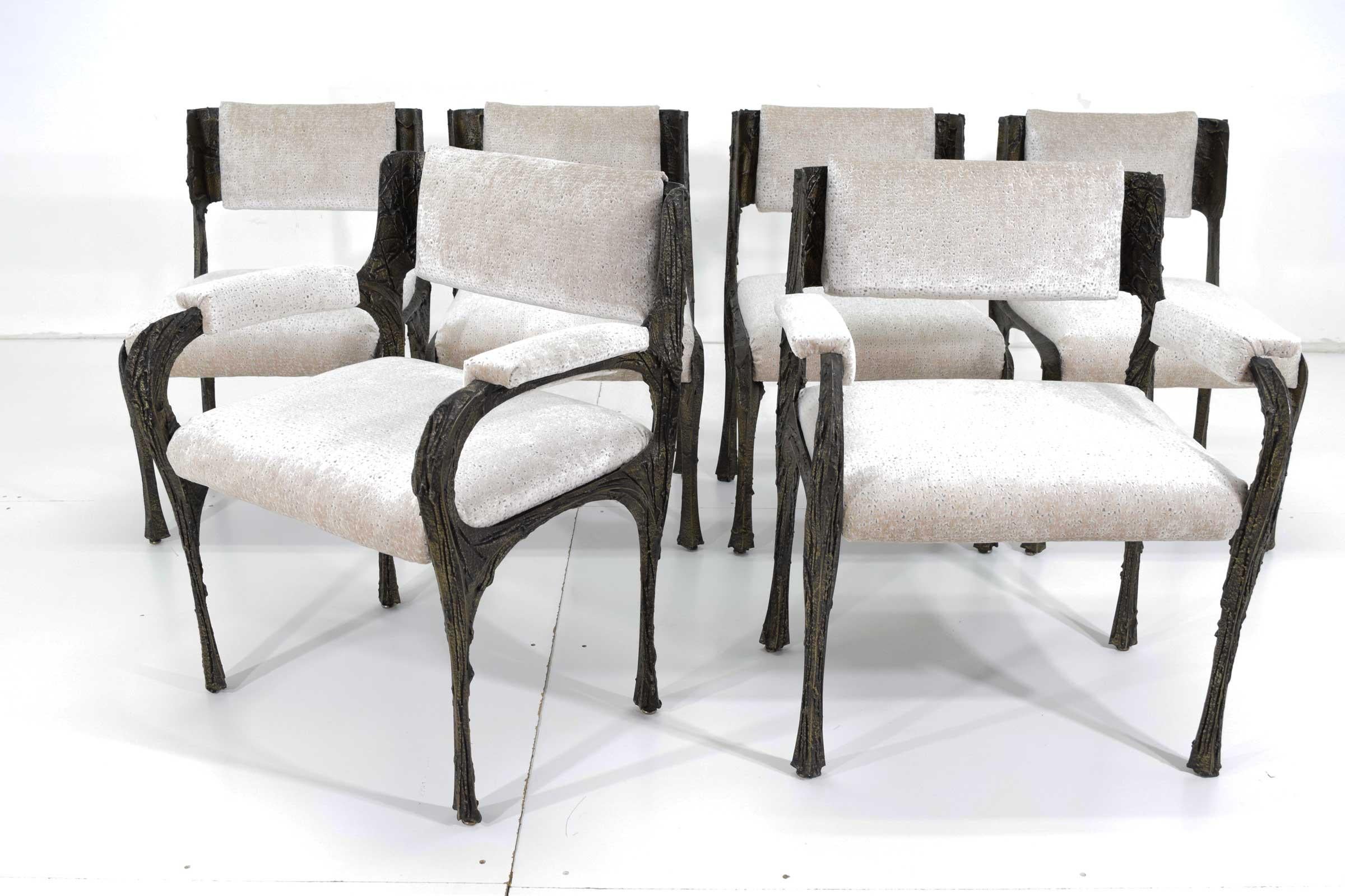 This is a beautiful set of Paul Evans' Brutalist bronze and resin dining chairs. These were owned by one owner who purchased in 1972 along with the dining table and has taken meticulous care of this set. New upholstery in a rich velvet. The chairs