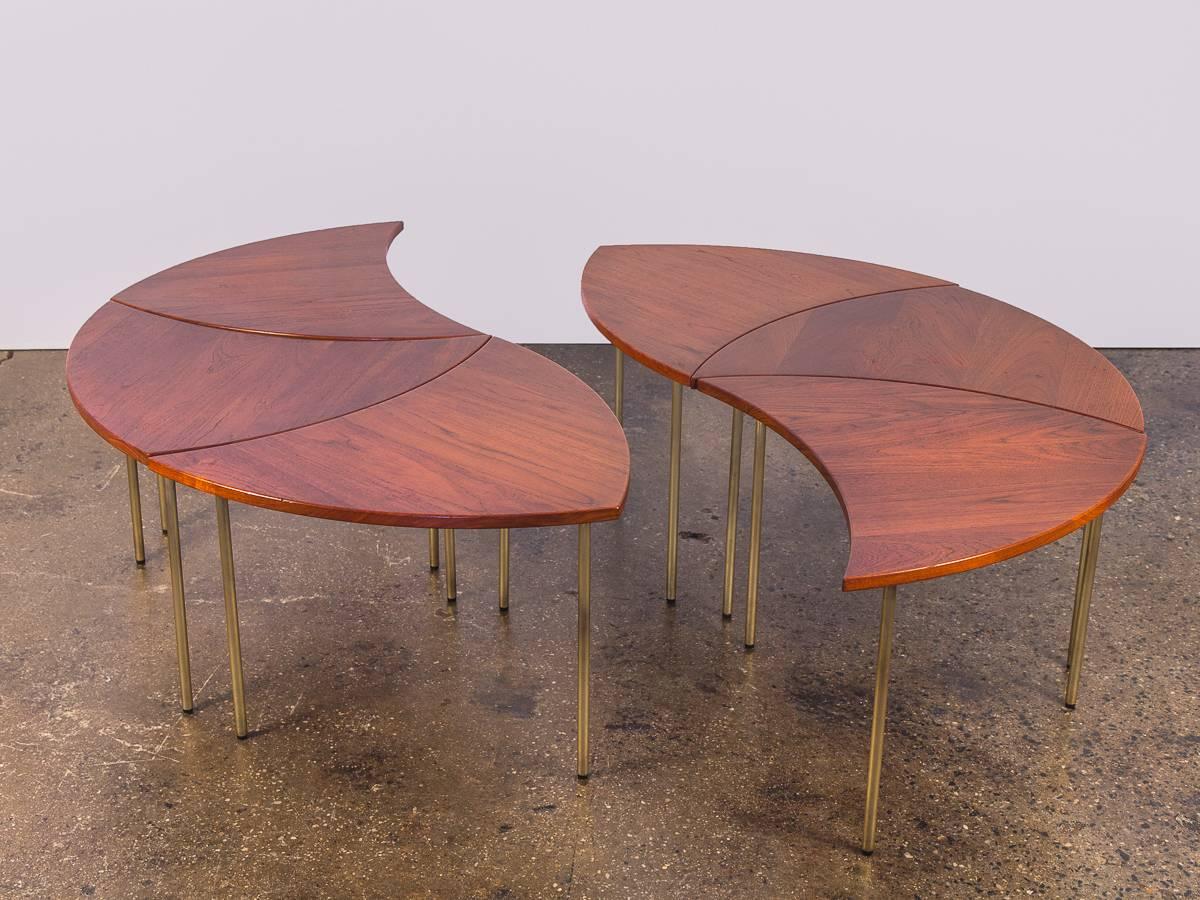Fantastic, rare set of six segmented tables designed by Peter Hvidt for John Stuart International. A versatile and playfully elegant set. The ingenious design allows for the tables to exist independently or in multiple arrangements. Configured all