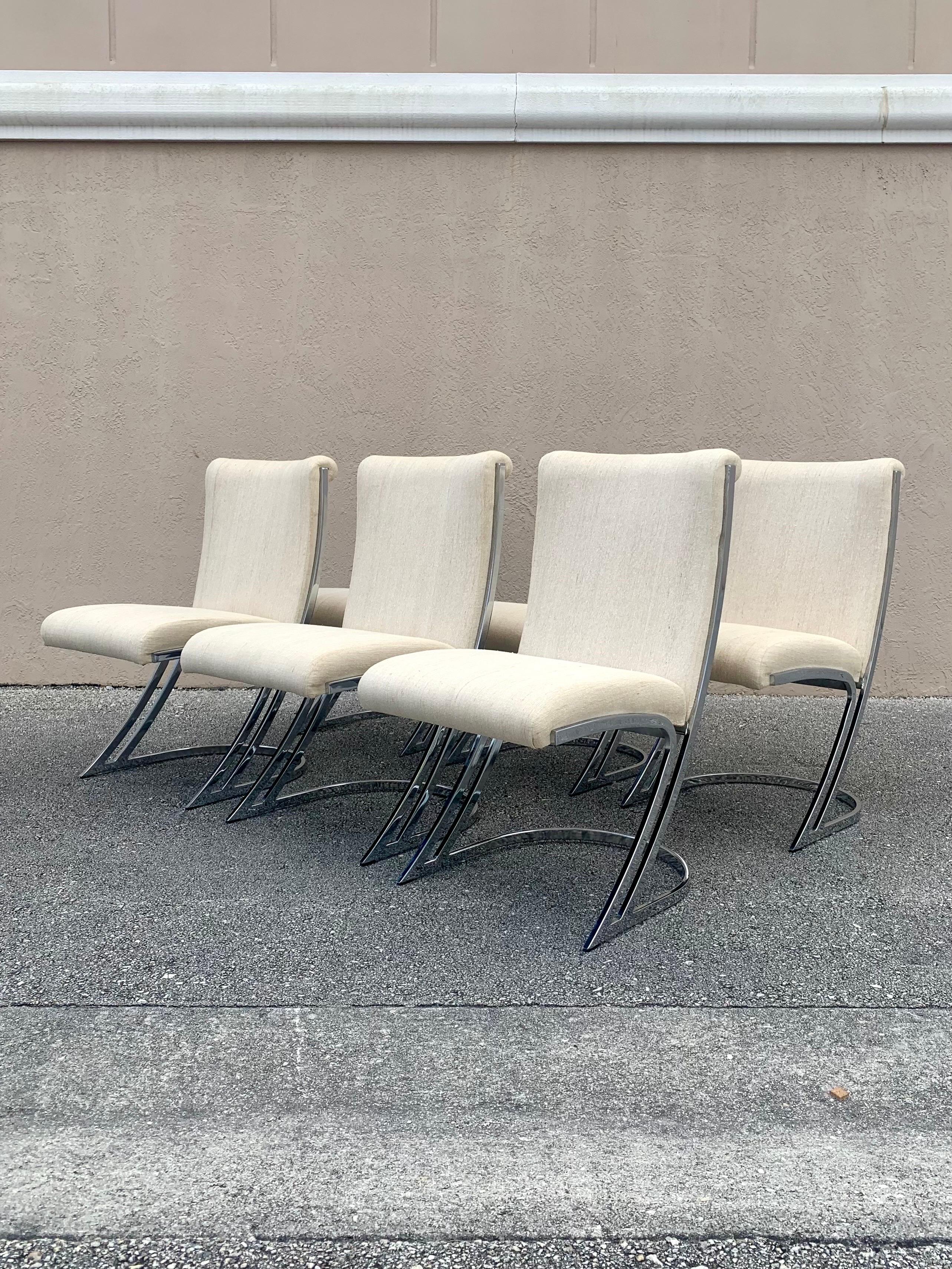 Striking set of six chrome dining chairs designed by Pierre Cardin. Sharp angles mixed with soft flowing curves set a very unique and captivating design from all angles. 

Chrome is in good condition for the most part with two small instances