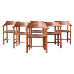 Ensemble de six chaises de salle à manger en pin du milieu du siècle attribuées à Rainer Daumiller